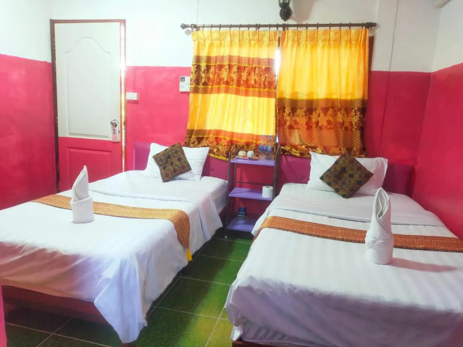 Bed in Sabaydee House at Pai