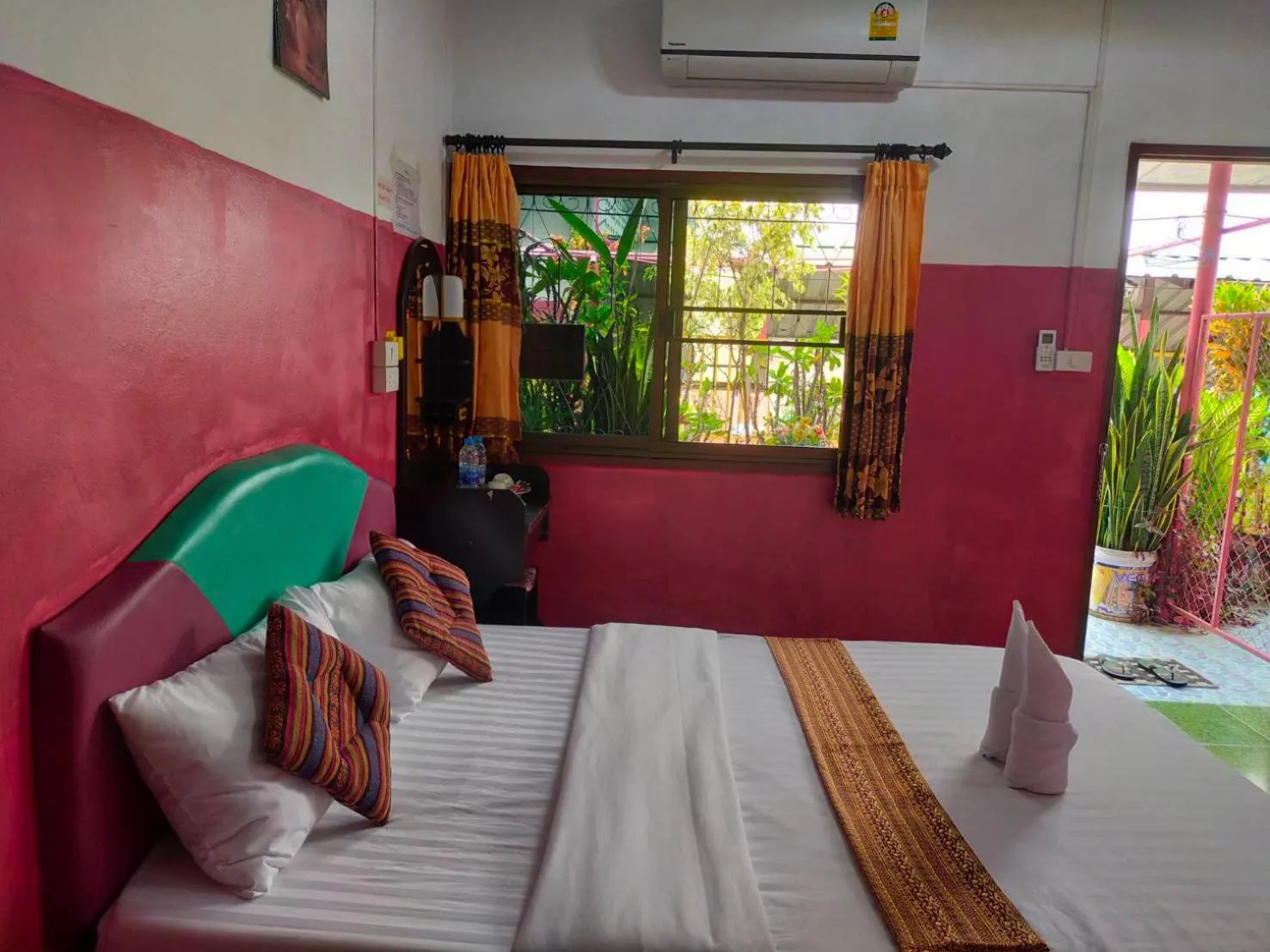 Bed in Sabaydee House at Pai