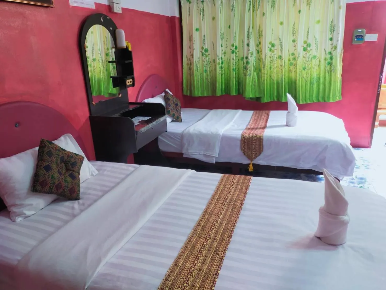 Bed in Sabaydee House at Pai