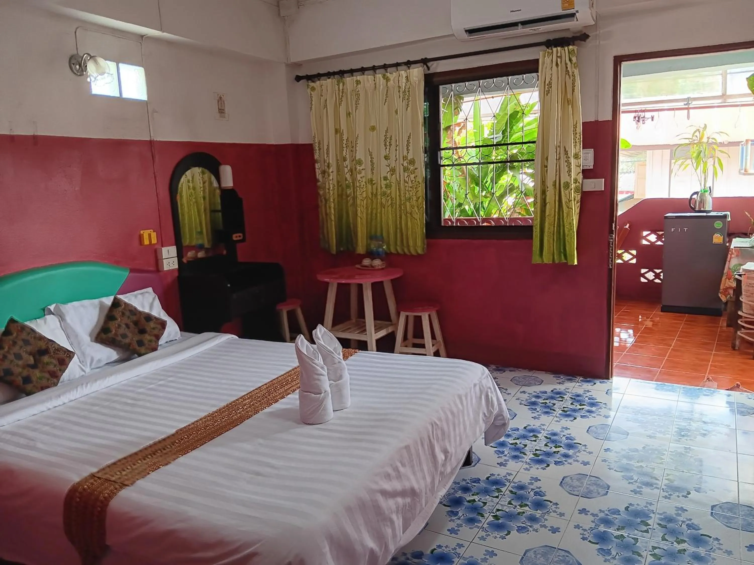 Bed in Sabaydee House at Pai