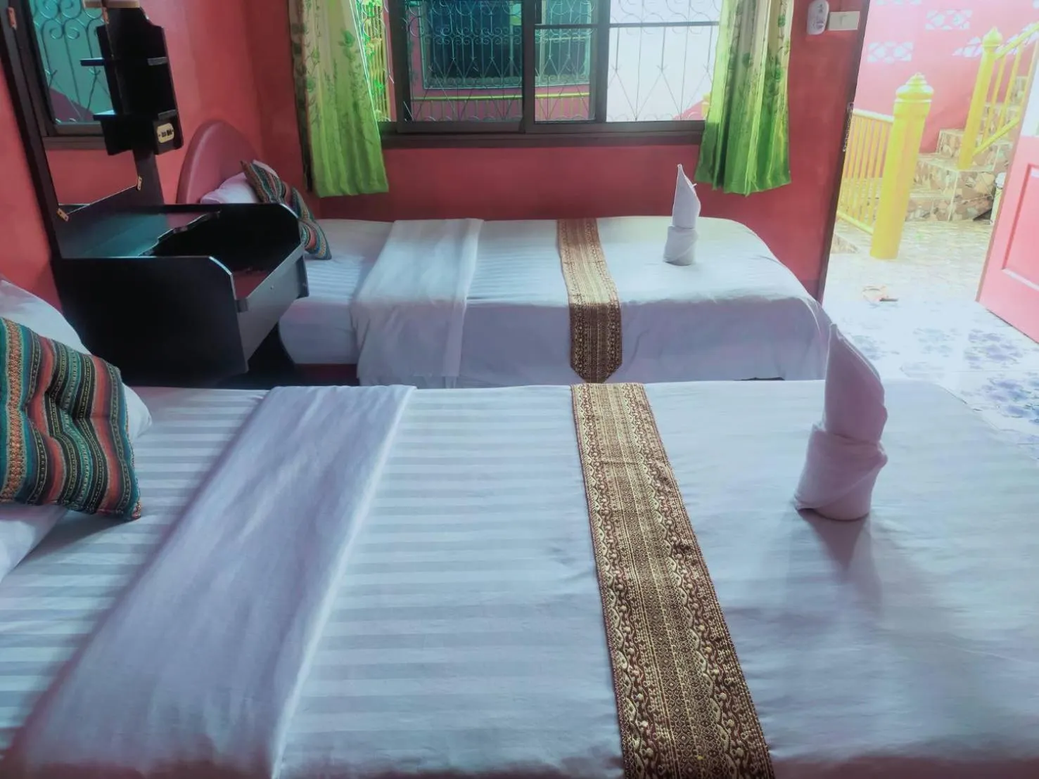 Bed in Sabaydee House at Pai
