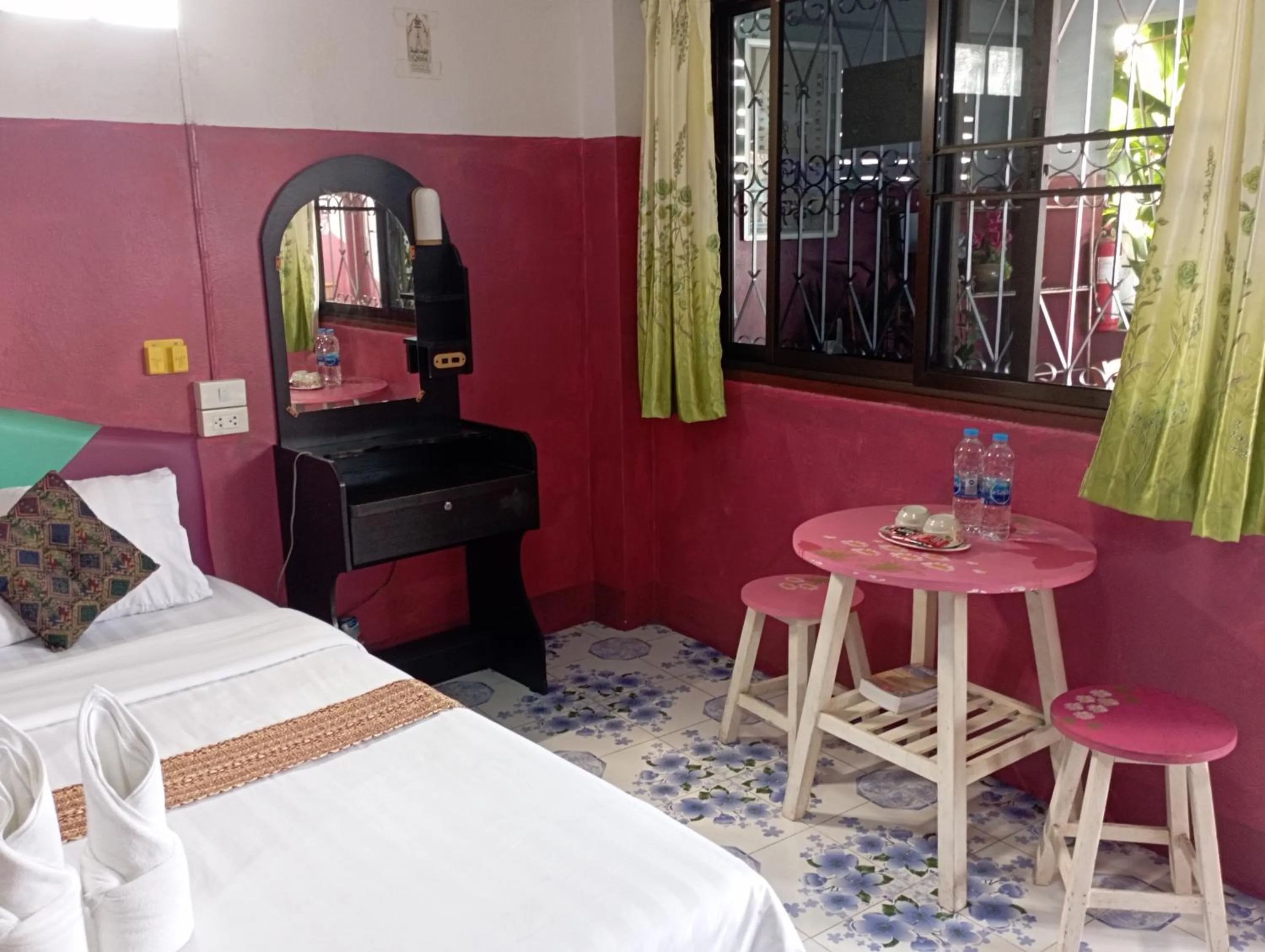 Bed in Sabaydee House at Pai