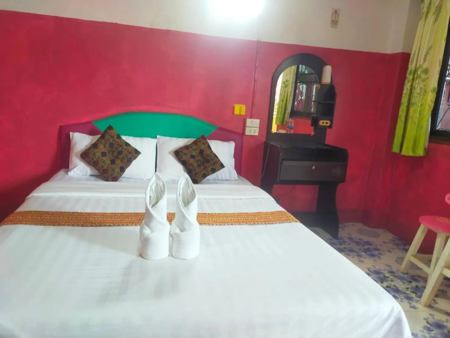 Bed in Sabaydee House at Pai