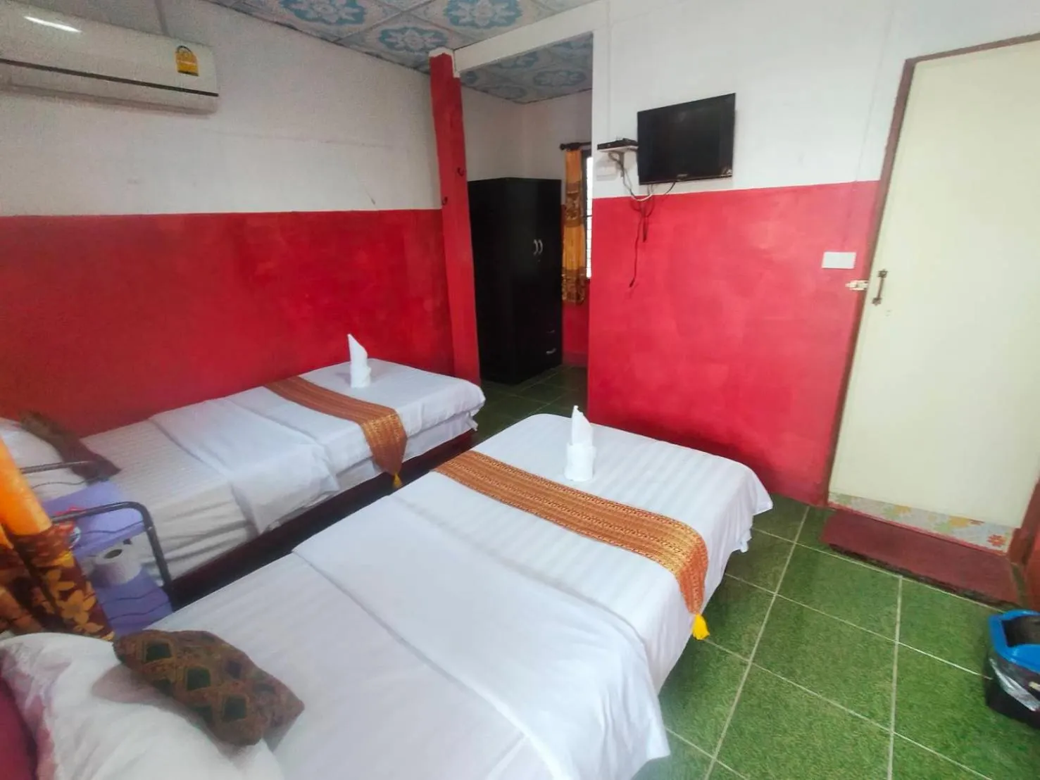 Bed in Sabaydee House at Pai