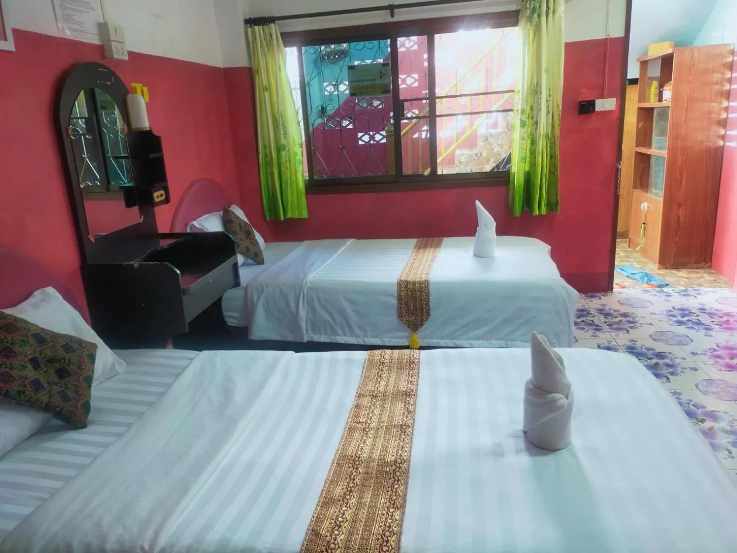 Bed in Sabaydee House at Pai
