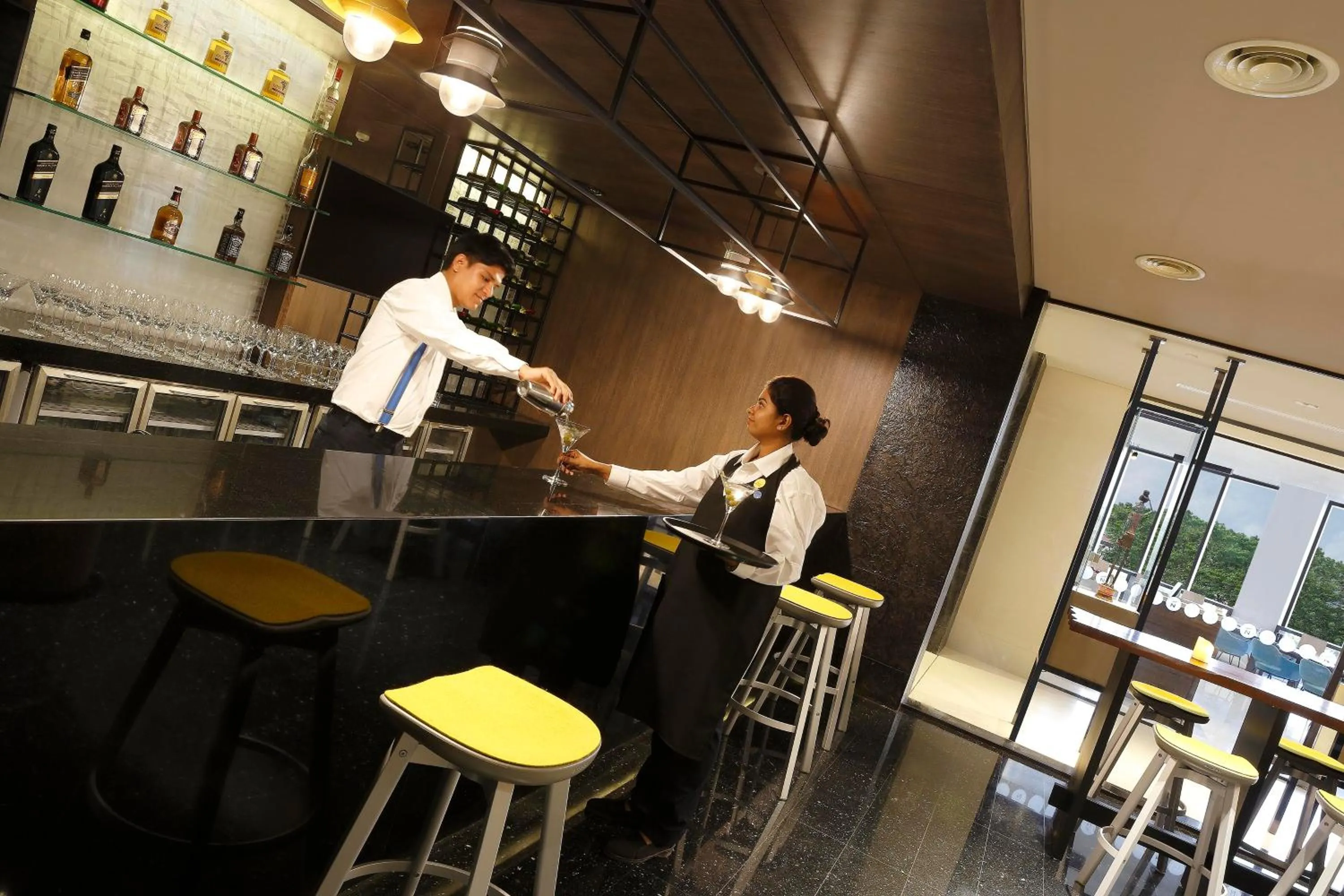 Lounge or bar in Novotel Kochi Infopark