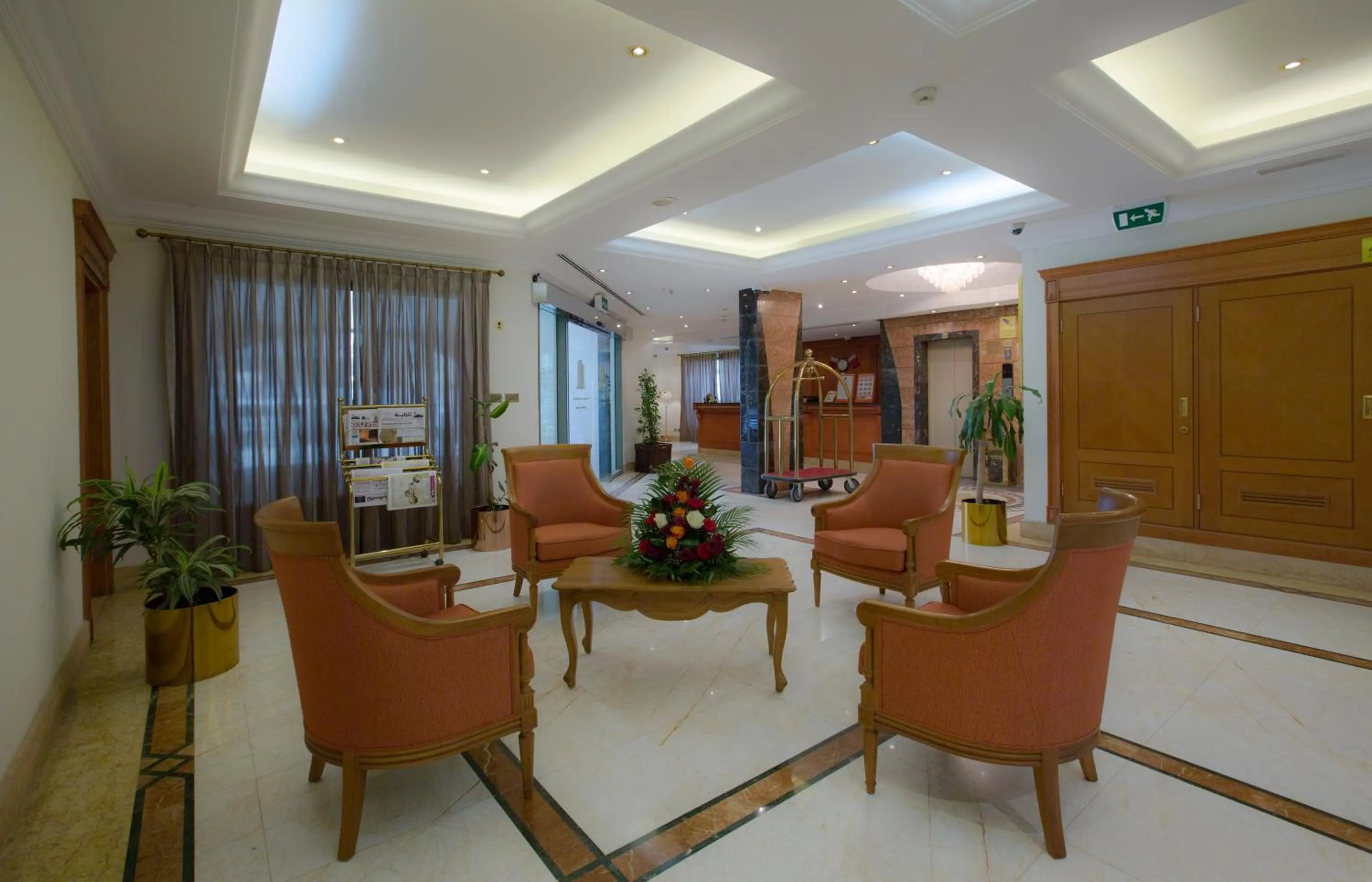 Communal lounge/ TV room in Al Madina Suites Doha