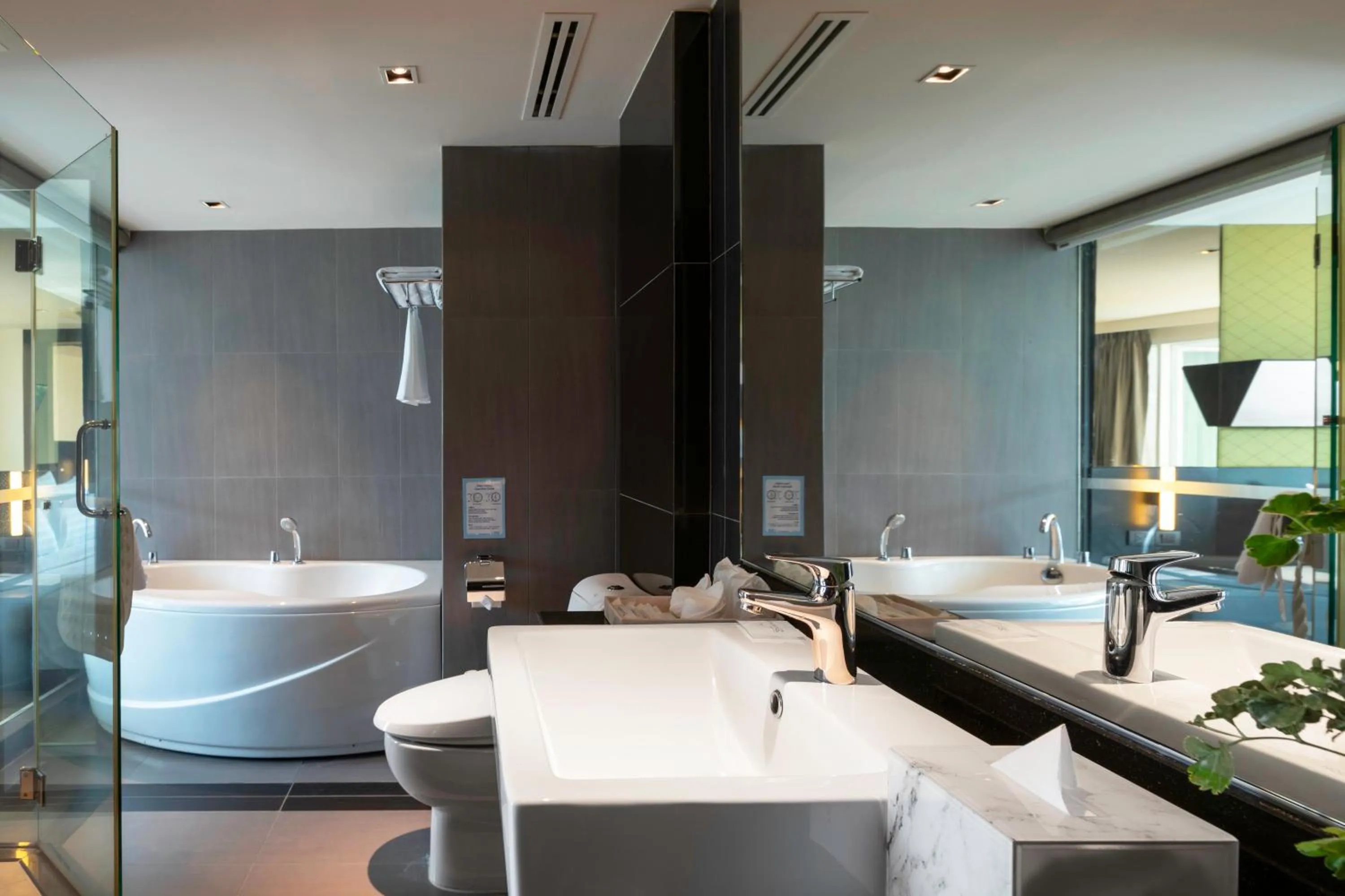 Bathroom in Golden Tulip Mandison Suites