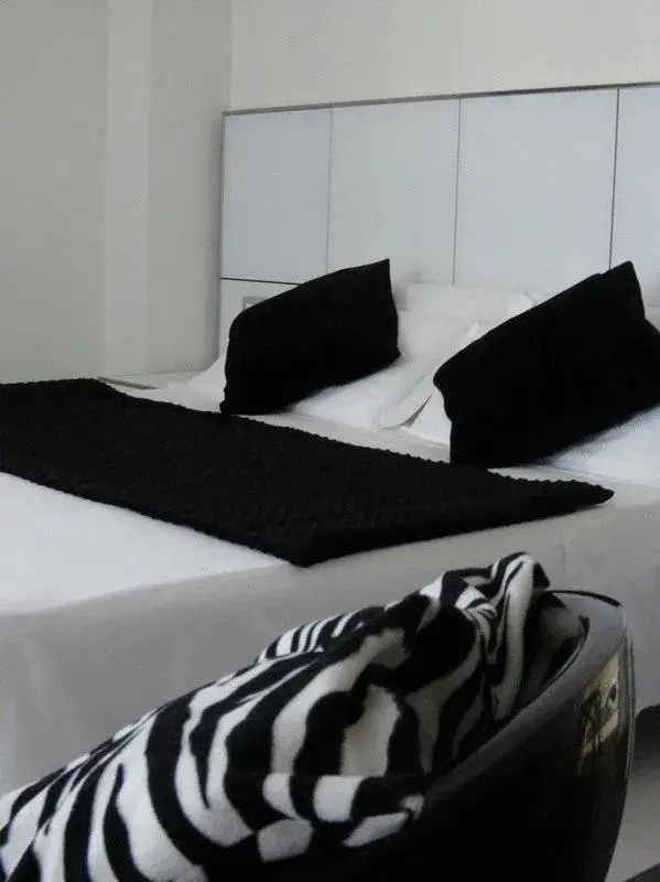 Bedroom, Bed in Atmosphere Suite Hotel