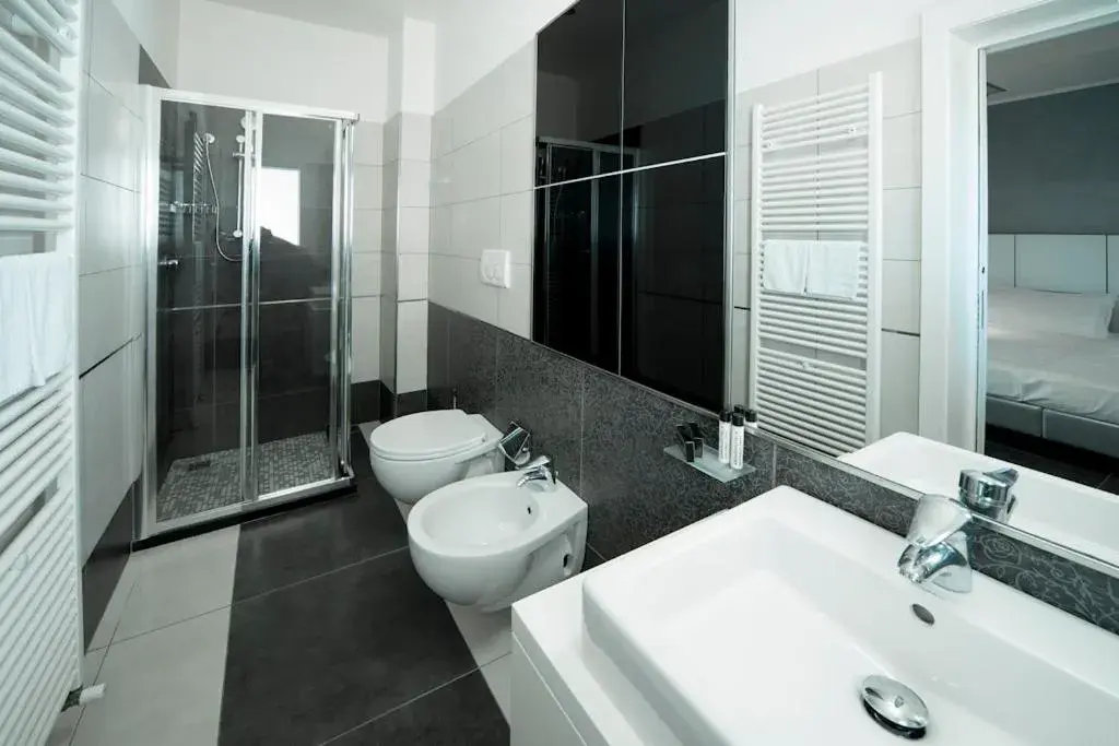 Bathroom in Atmosphere Suite Hotel