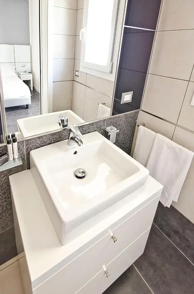 Bathroom in Atmosphere Suite Hotel