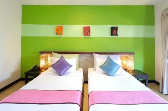 Bed in Purimuntra Resort and Spa