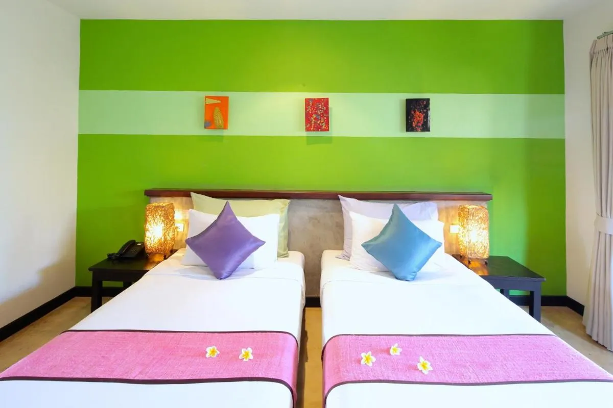 Bed in Purimuntra Resort and Spa