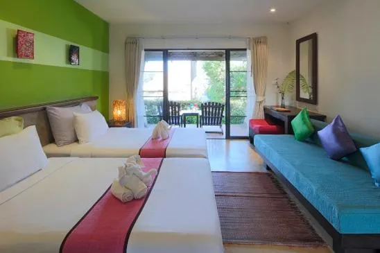 Bed in Purimuntra Resort and Spa