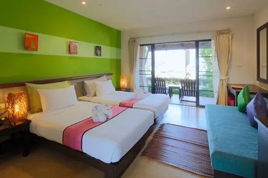 Bed in Purimuntra Resort and Spa