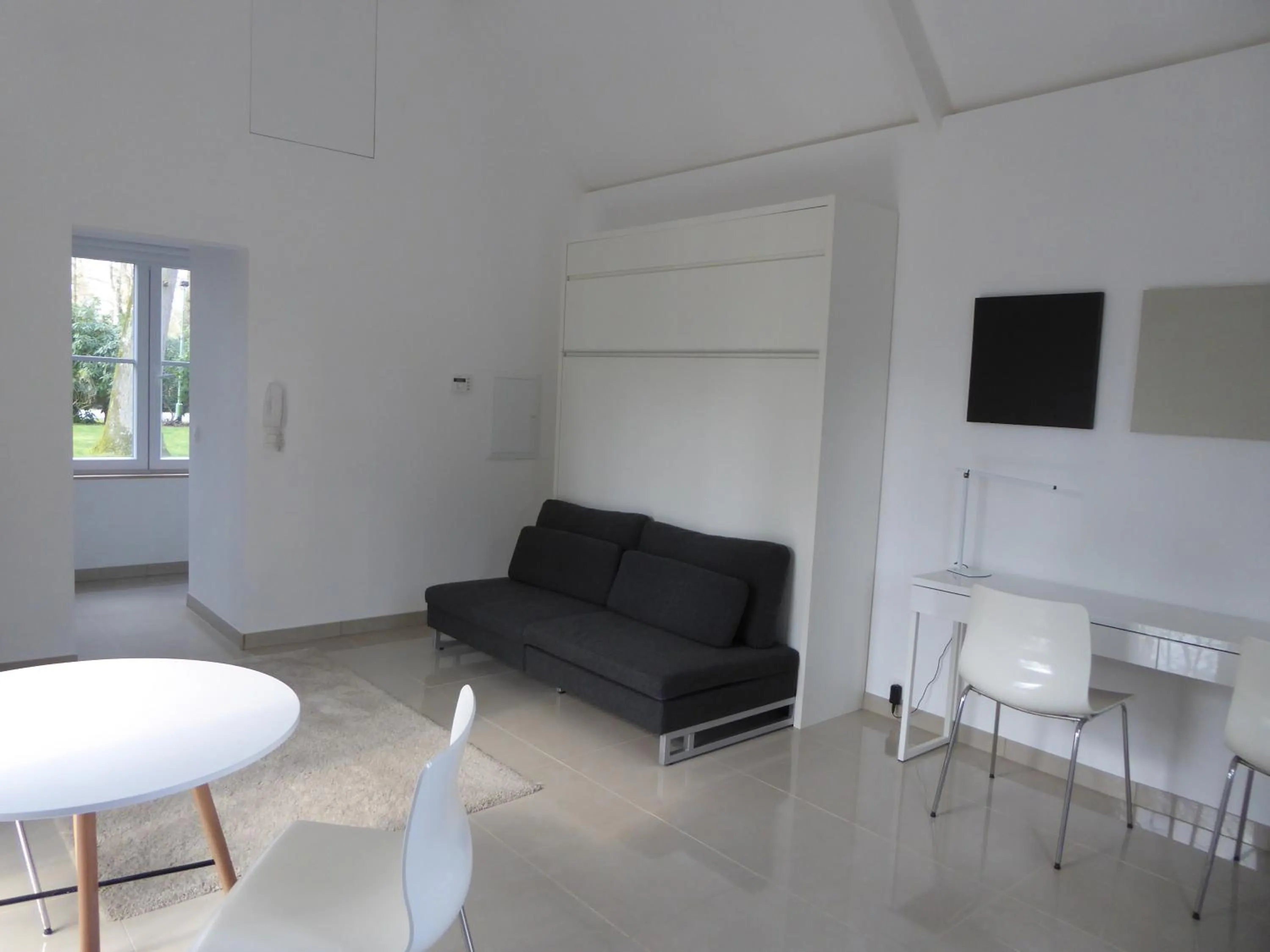 Communal lounge/ TV room in B&B Goudvink
