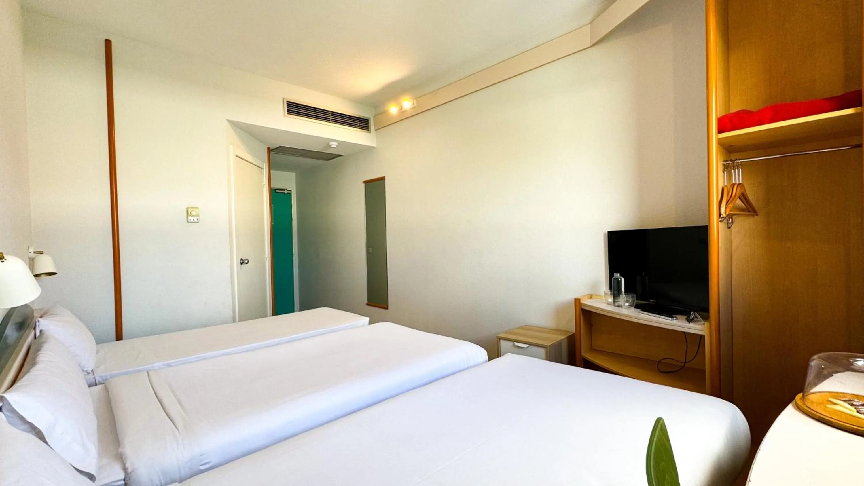 Bed in Hotel Iris Guadalajara