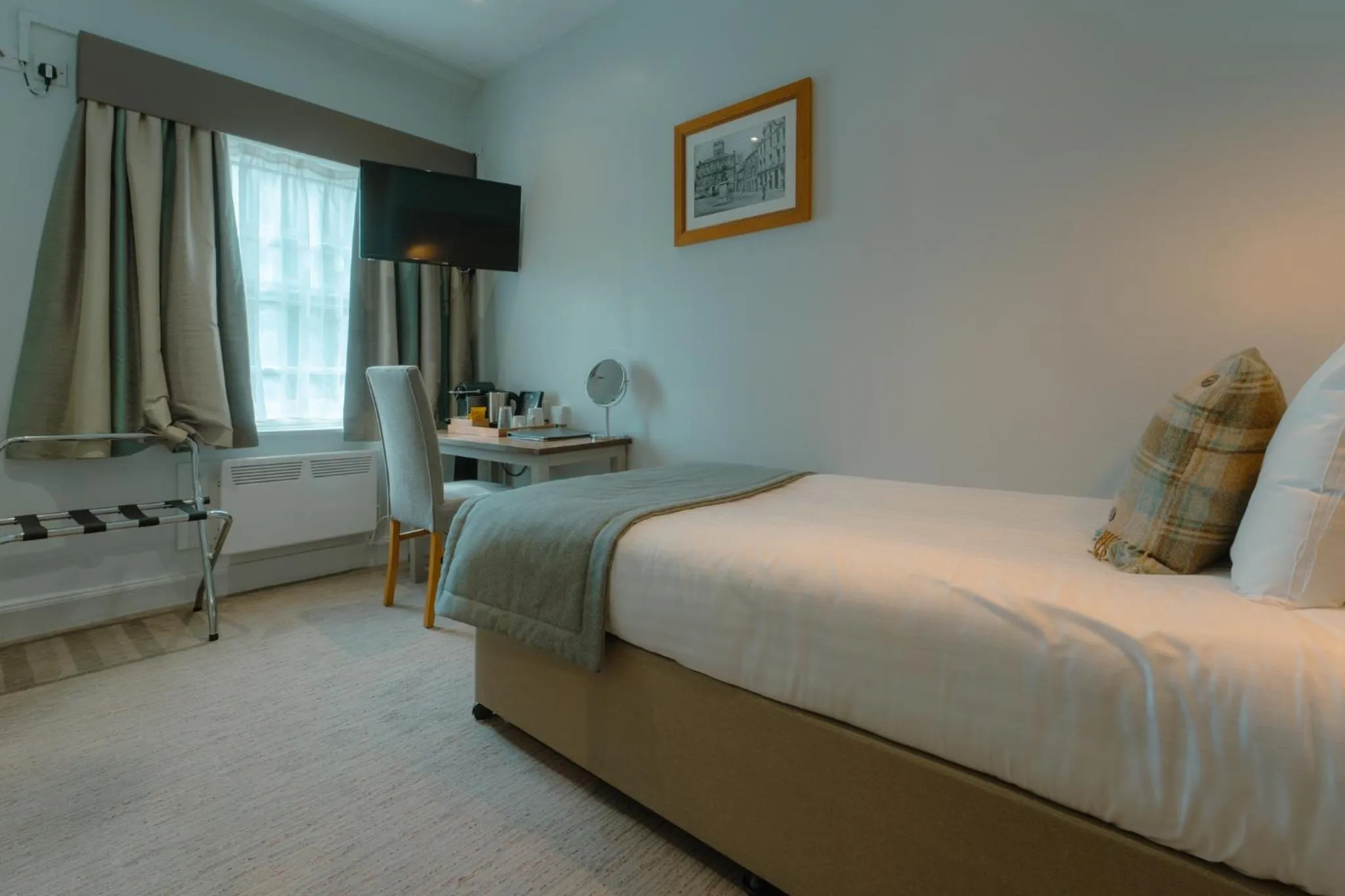 Bed in West Port Hotel