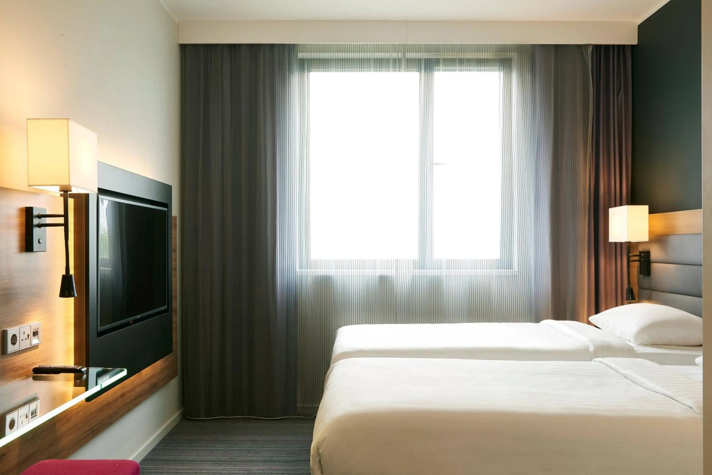 Photo of the whole room, Bed in Moxy Munich Messe