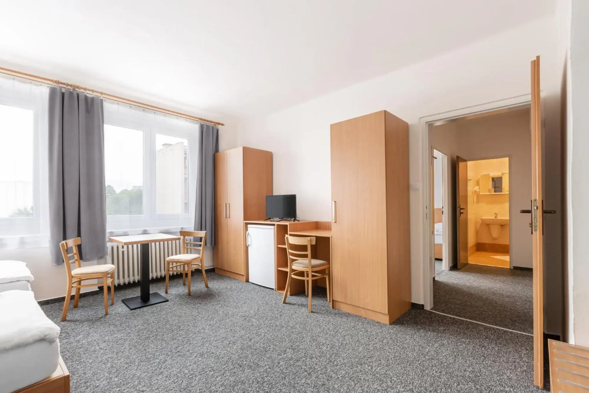 Quadruple Room with Private Bathroom in Hotel Trim Quadruple Room with Private Bathroom in Hotel Trim