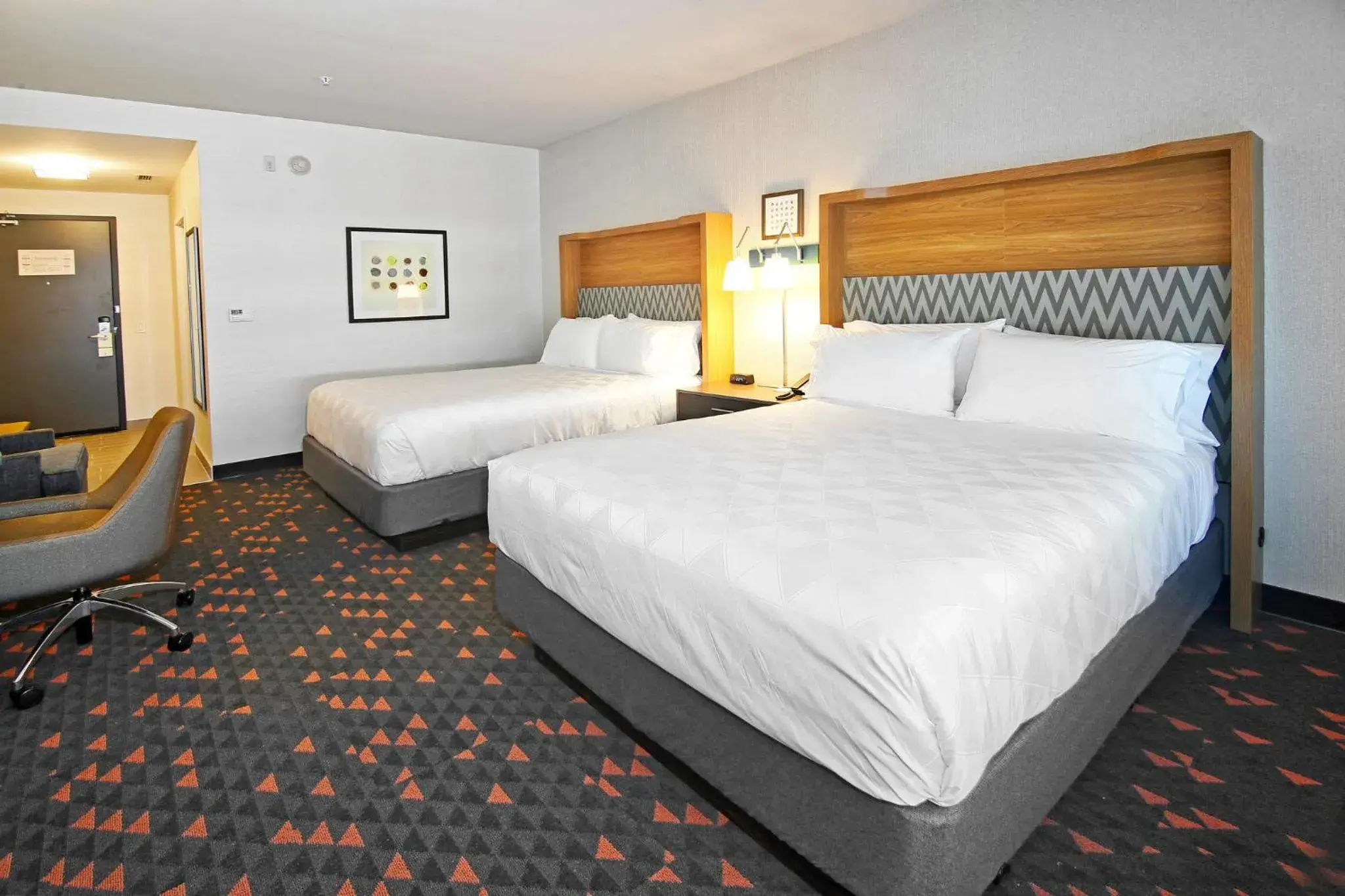 Photo of the whole room, Bed in Holiday Inn Hotel & Suites - Calgary Airport North by IHG Photo of the whole room, Bed in Holiday Inn Hotel & Suites - Calgary Airport North by IHG