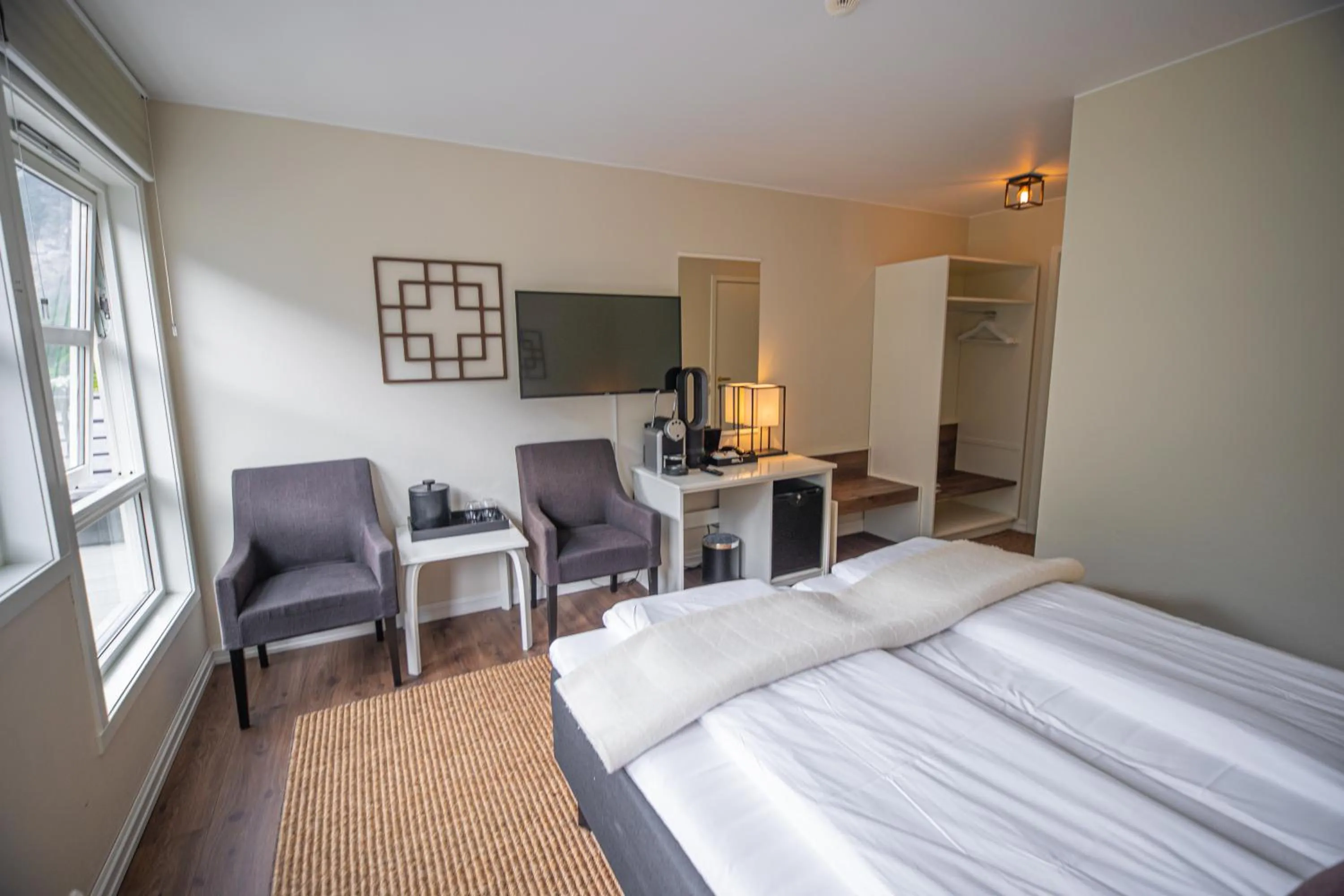 Bed in Grande Fjord Hotel