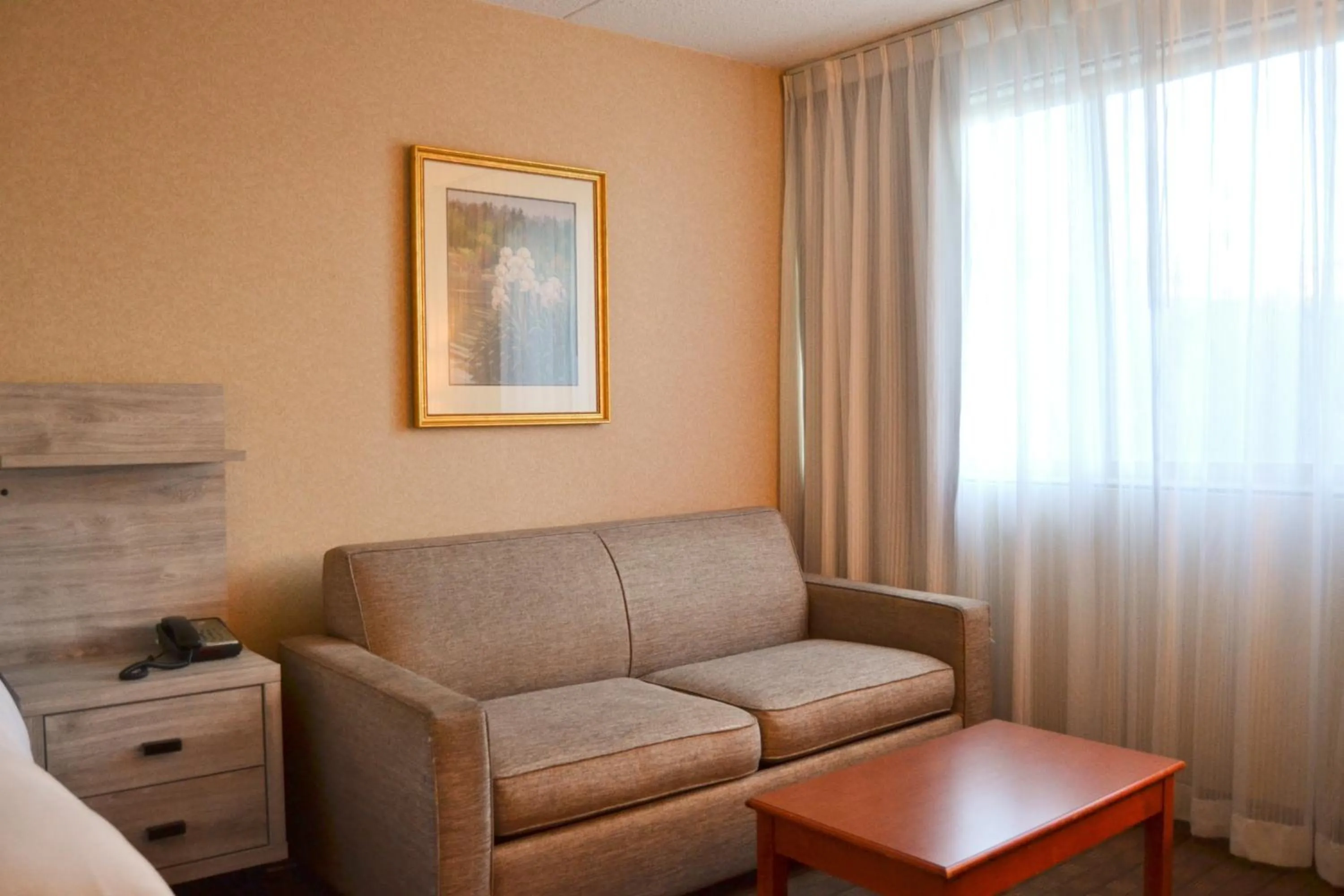 Seating area in Amenida Residences, Calgary