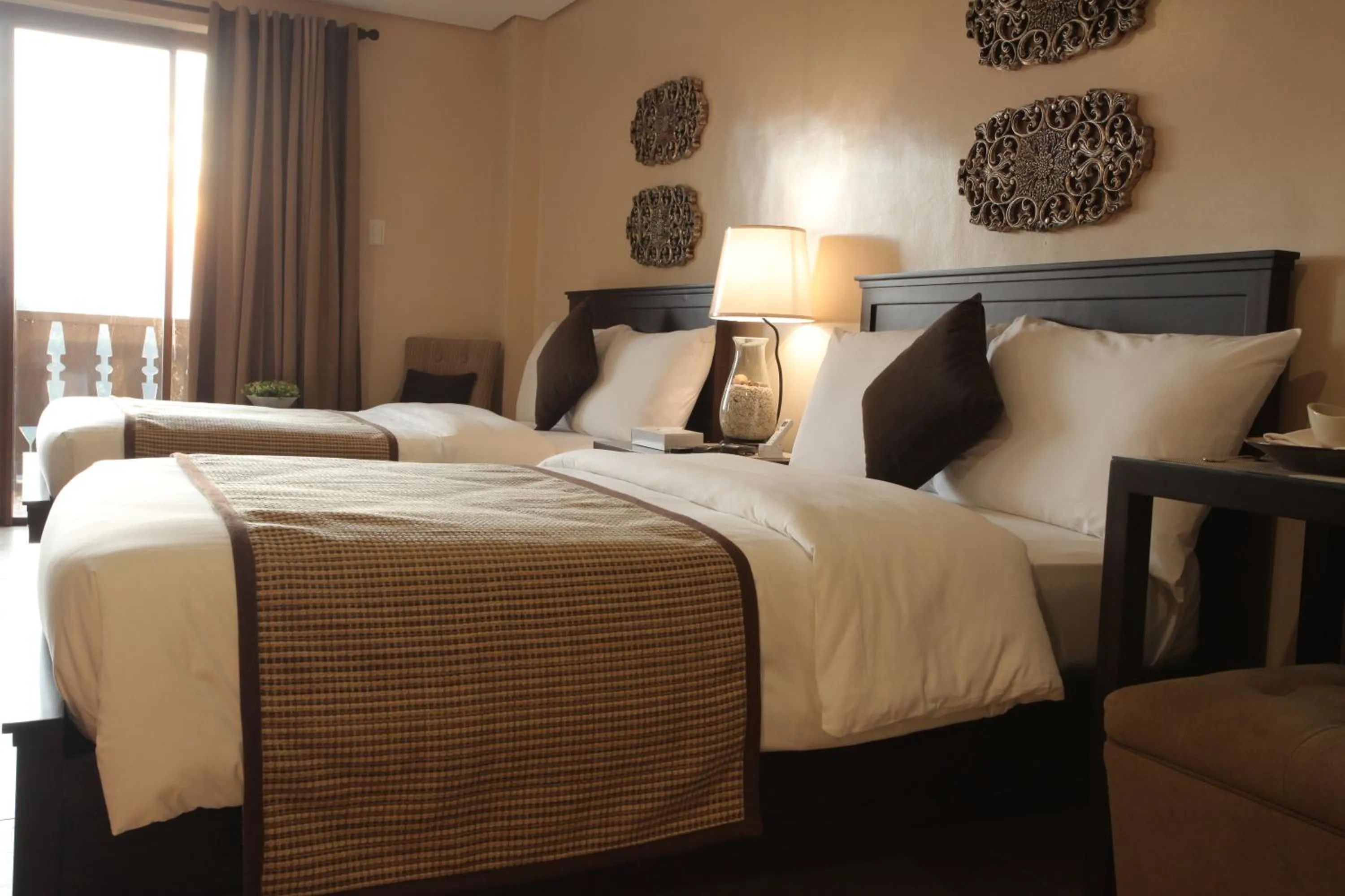 Bed in Crosswinds Resort Suites