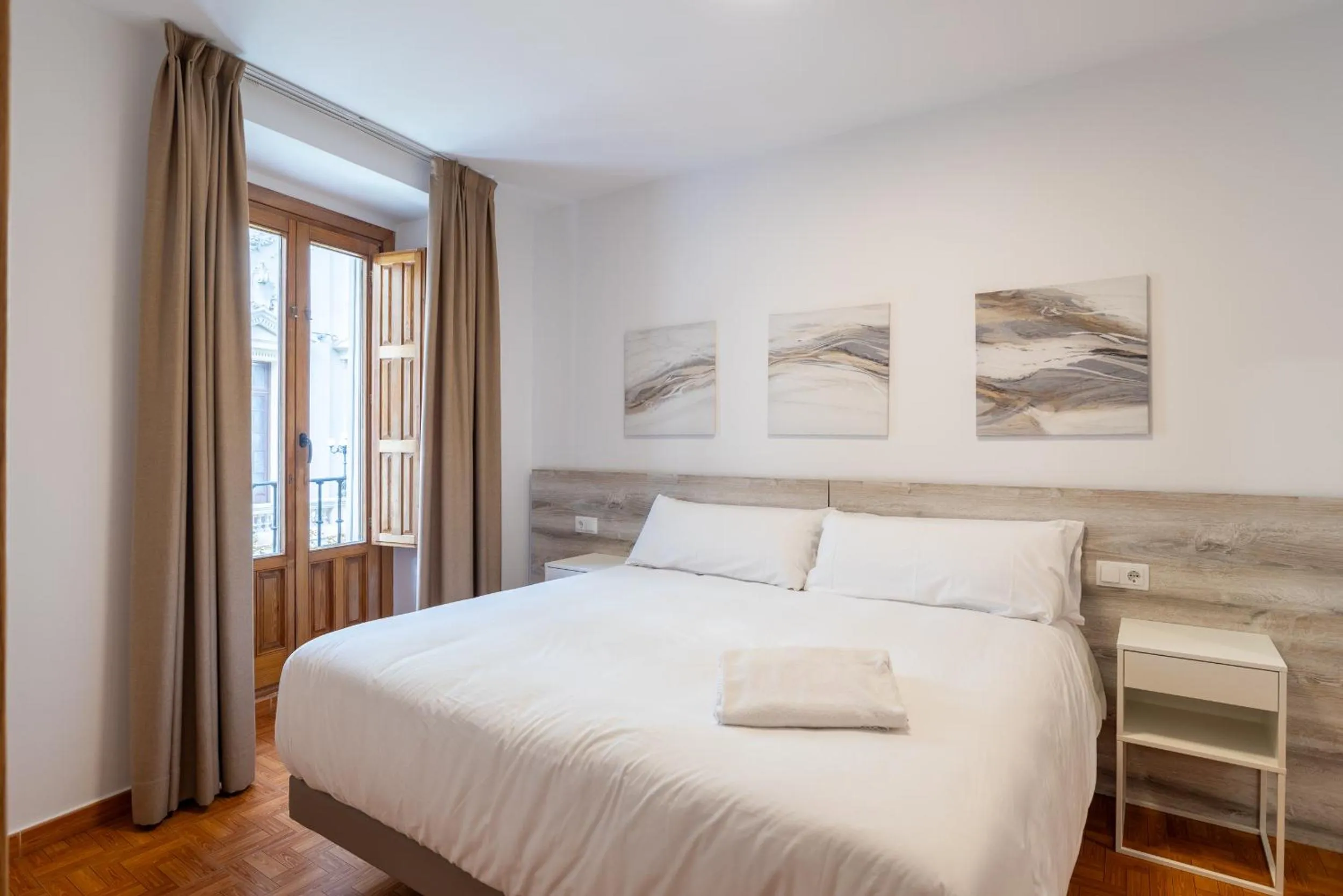 Bed in Apartamentos Madrid