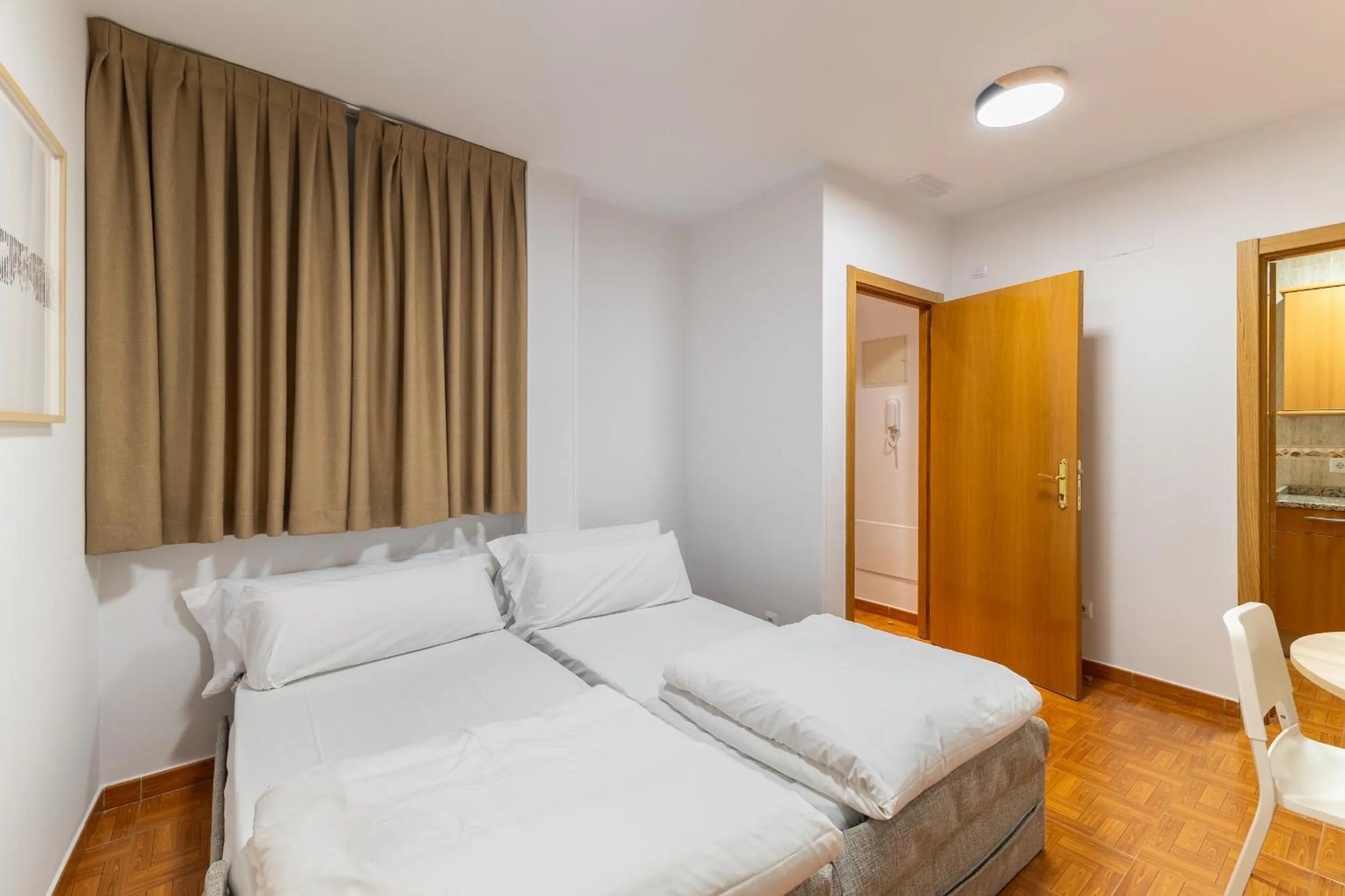 Bed in Apartamentos Madrid