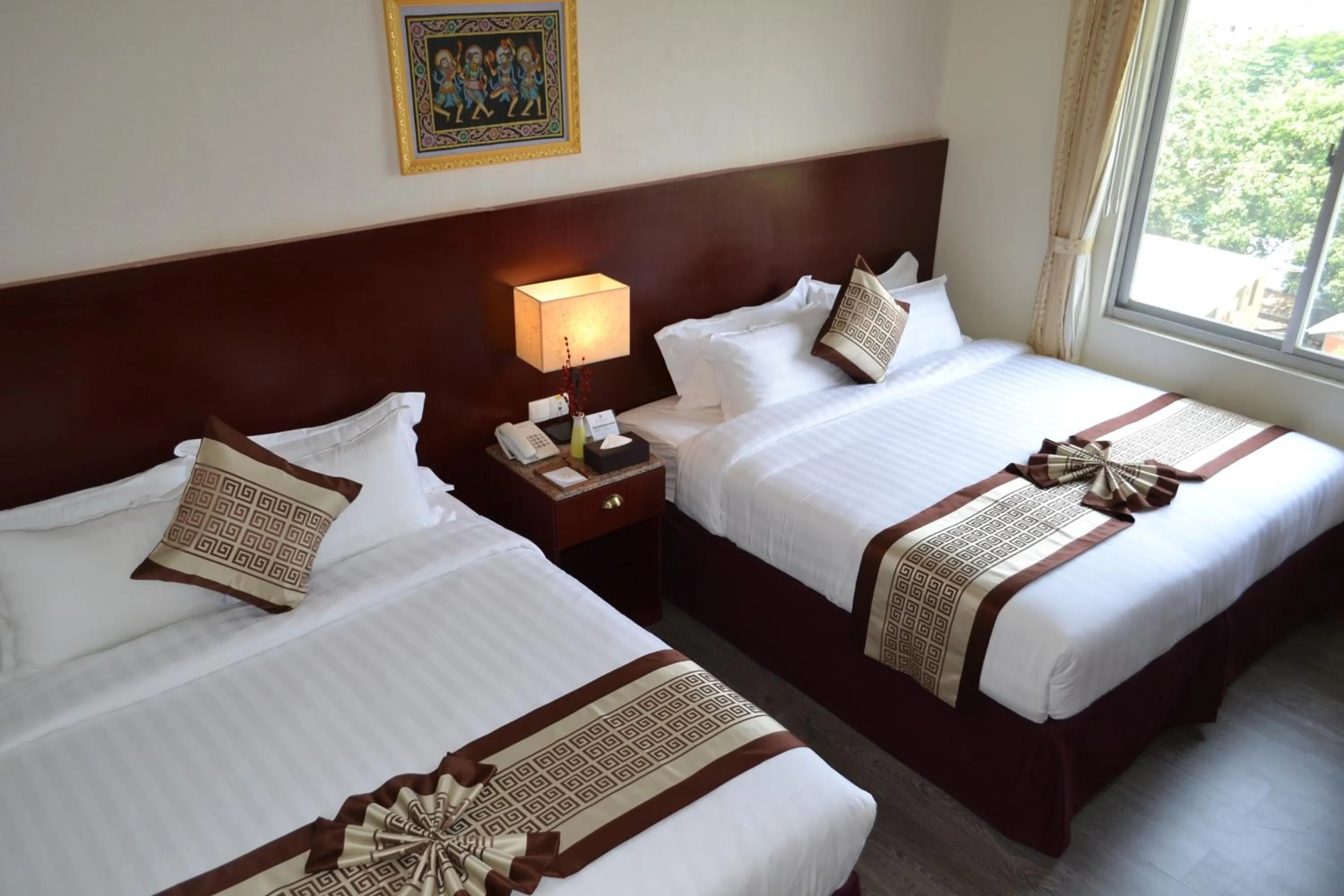 Bed in Hotel Broadway Yangon