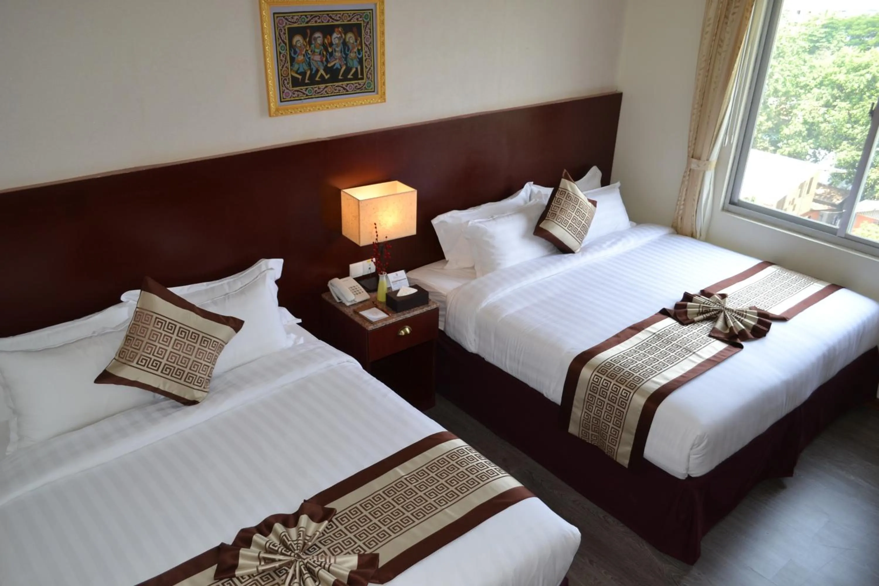 Bed in Hotel Broadway Yangon