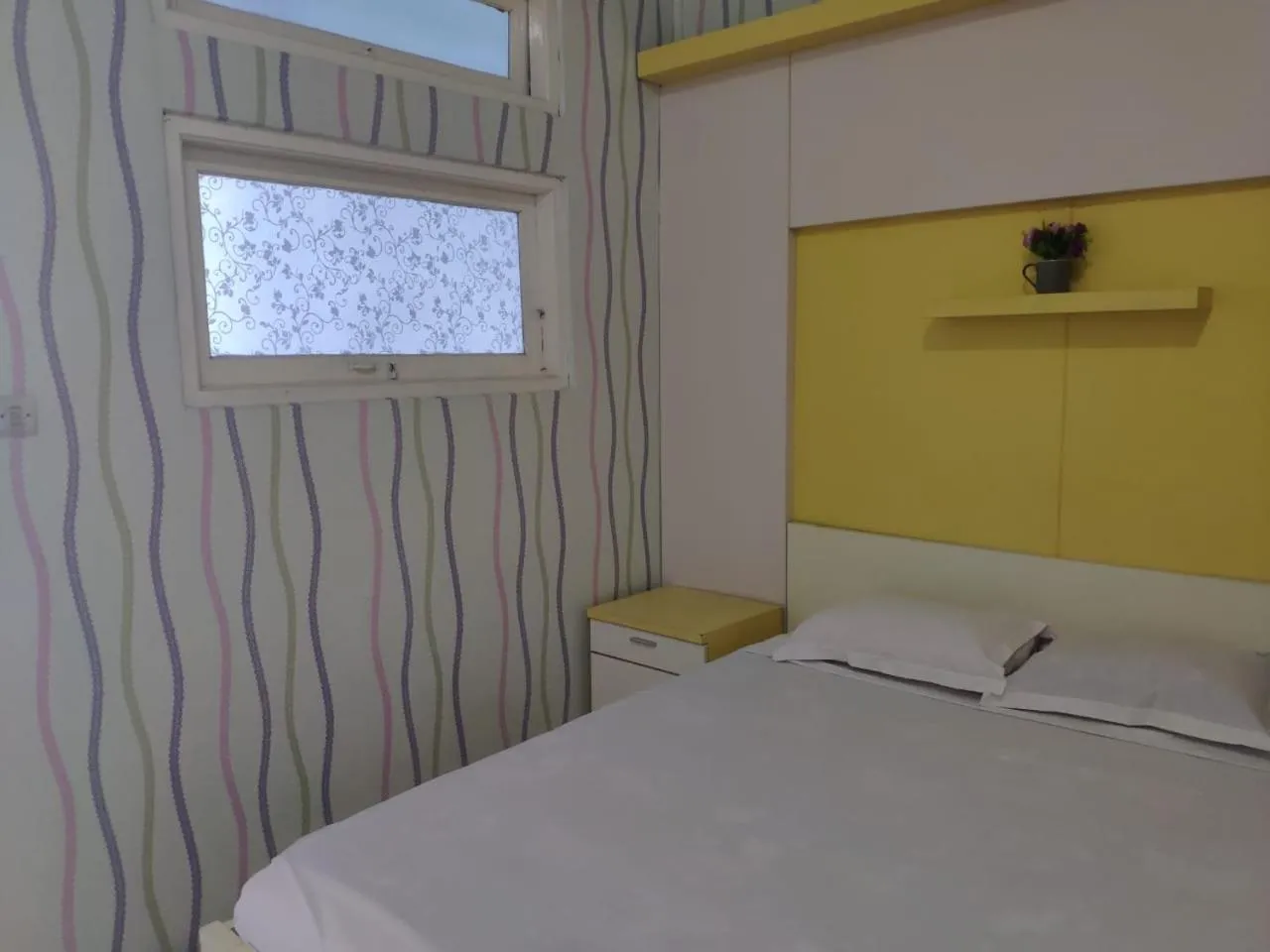 Bed in Hotel Boegenviel Syariah