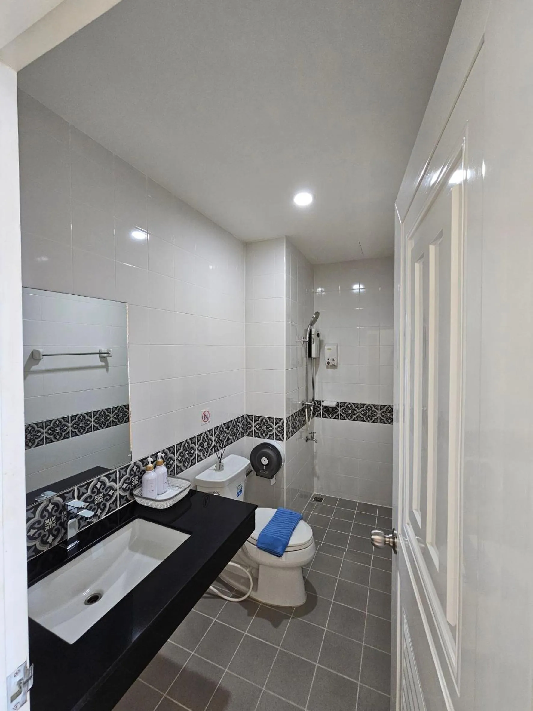 Bathroom in Dwell Phuket Airport Hotel at Naiyang