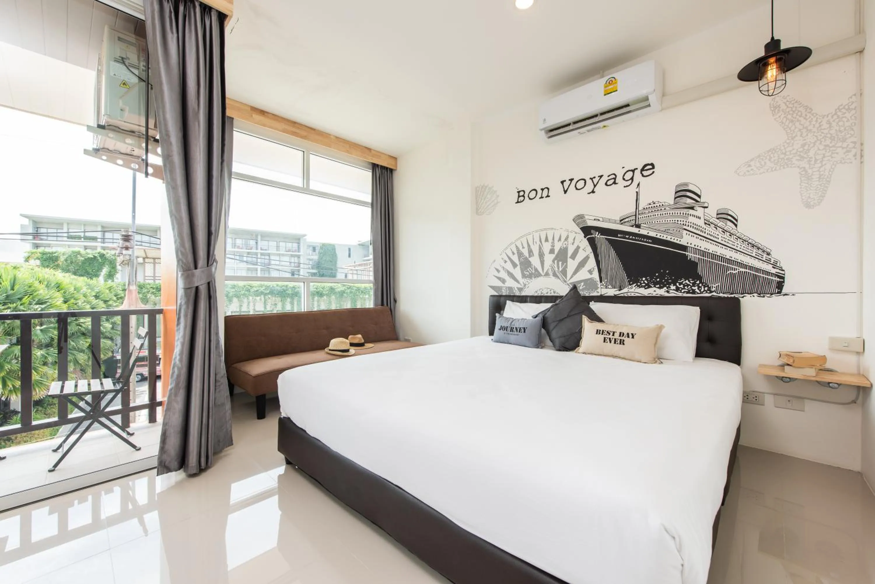 Photo of the whole room, Bed in Dwell Phuket Airport Hotel at Naiyang