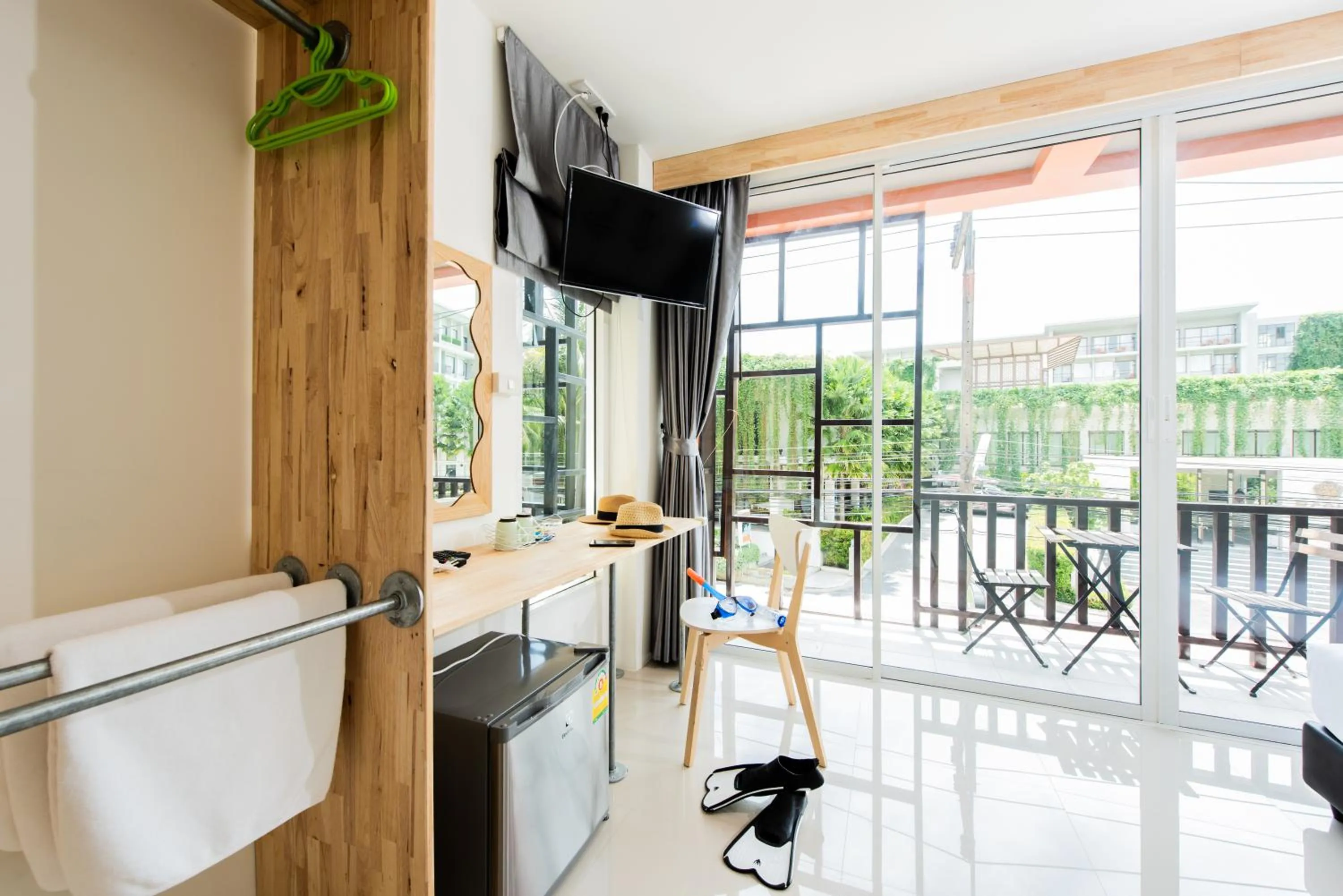 TV and multimedia in Dwell Phuket Airport Hotel at Naiyang