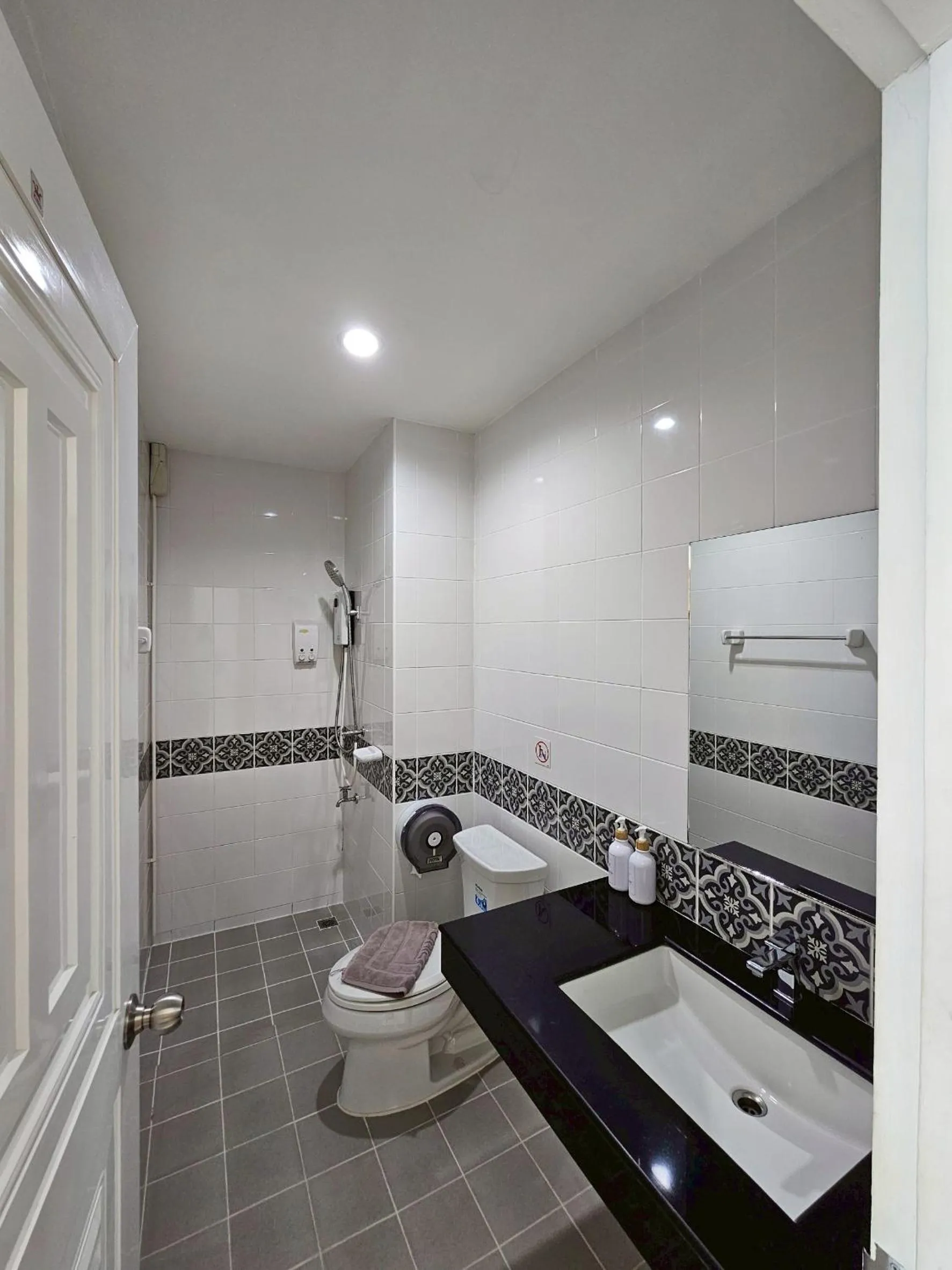 Shower in Dwell Phuket Airport Hotel at Naiyang