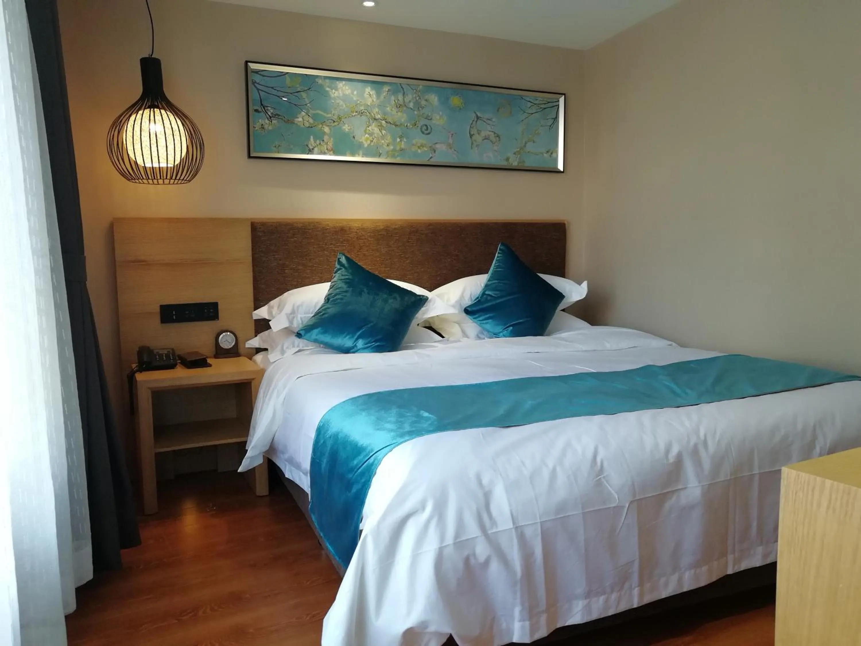 Bed in Harbin Joy Boutique Hotel