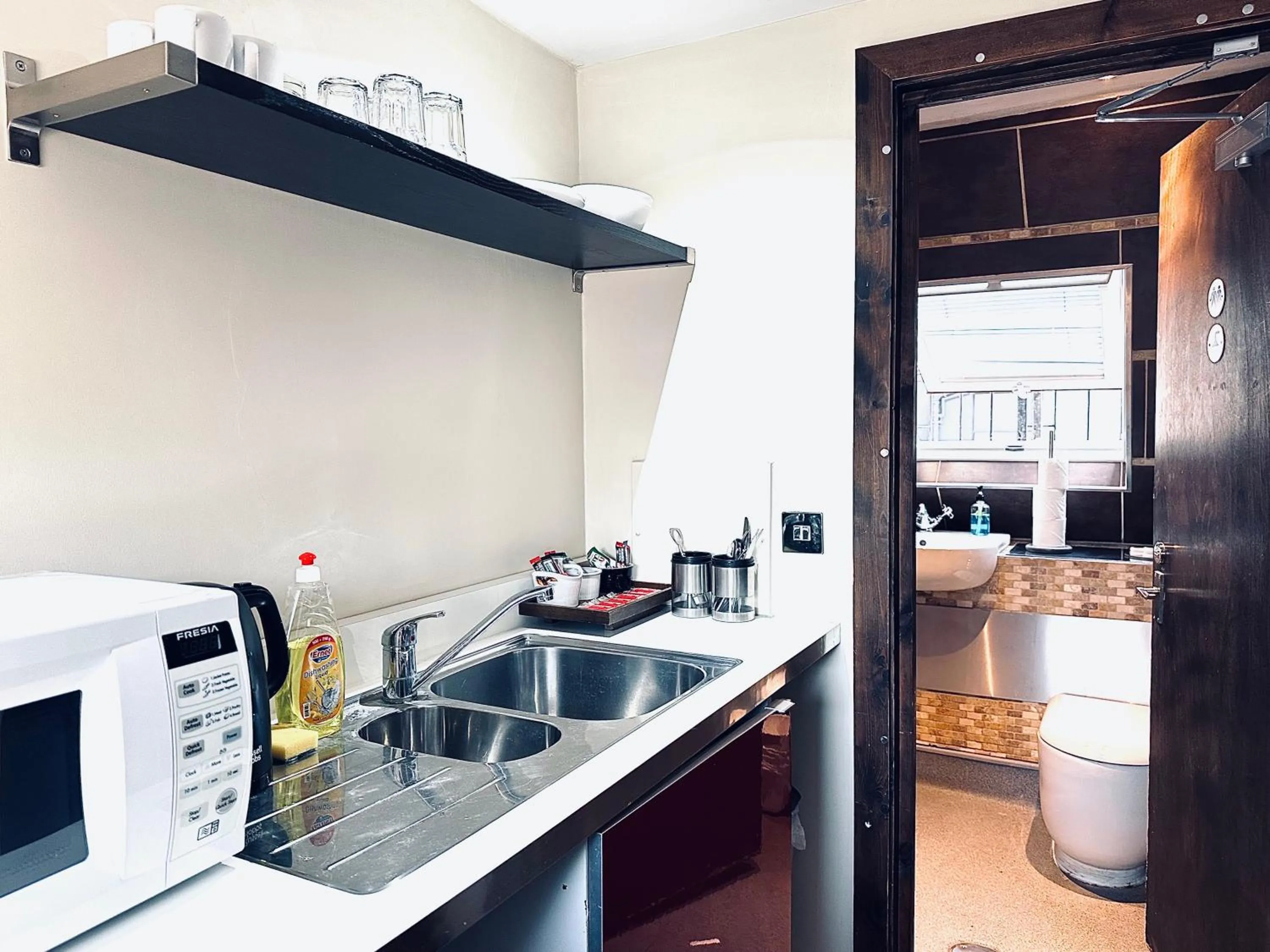 Kitchen or kitchenette in Guest And The City