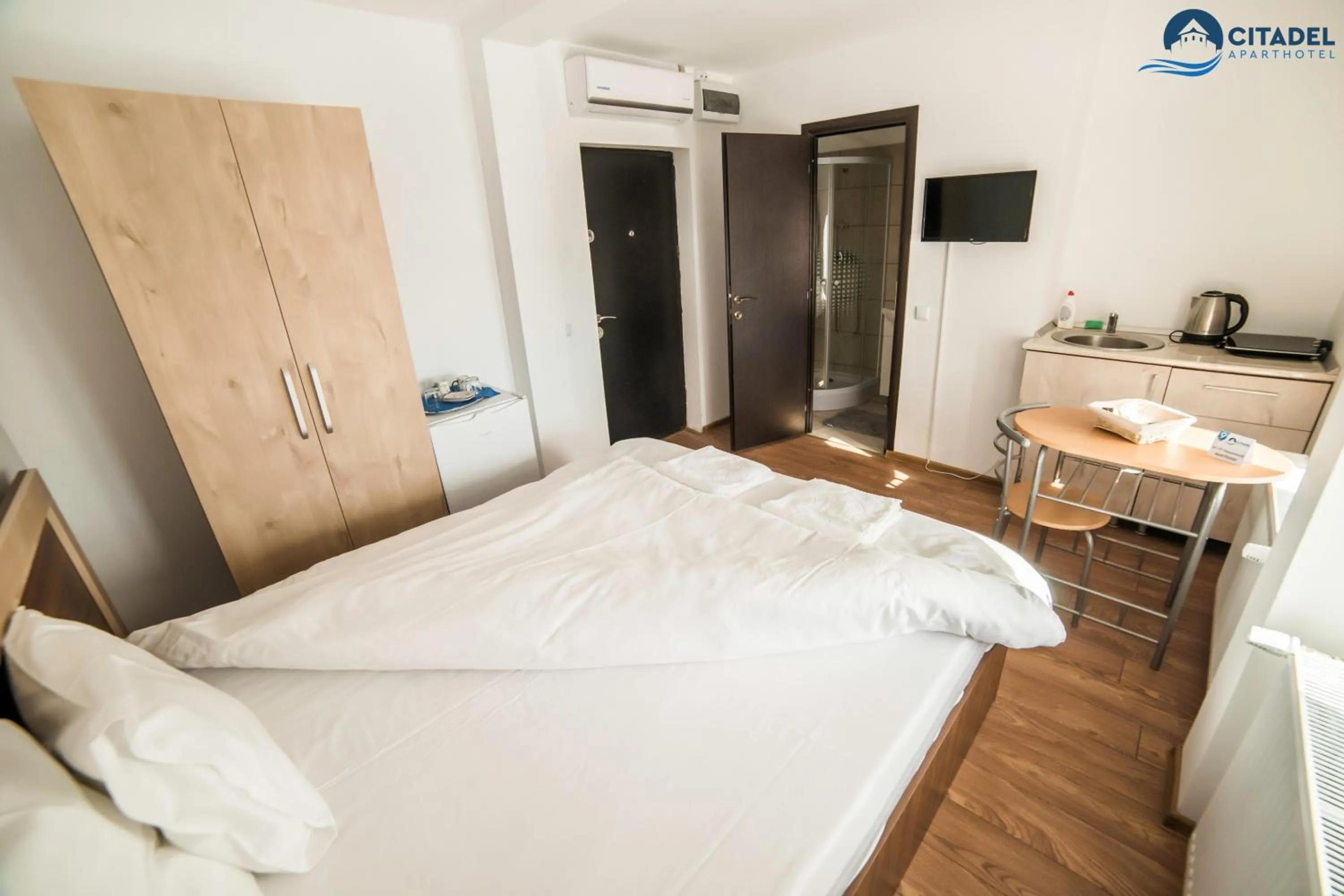 Bed in Citadel Aparthotel