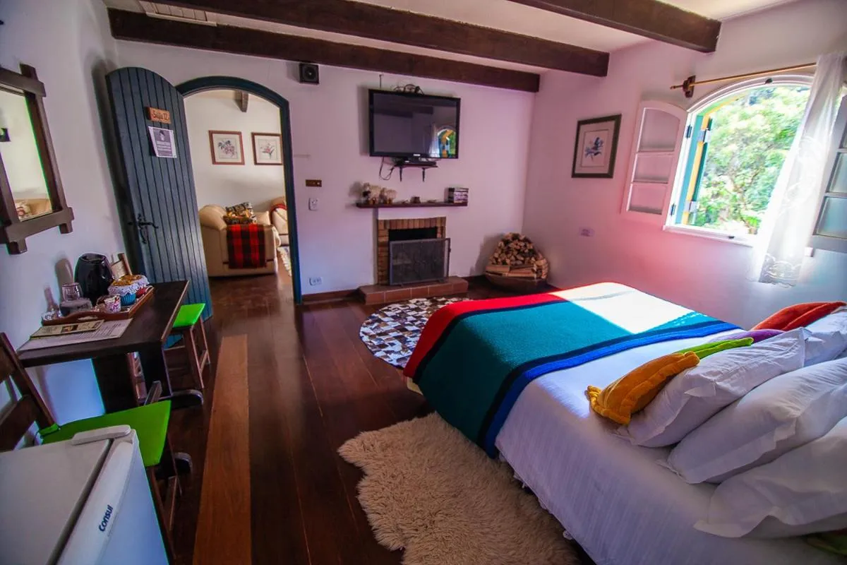 Photo of the whole room, Bed in Pousada Villa D'Amore