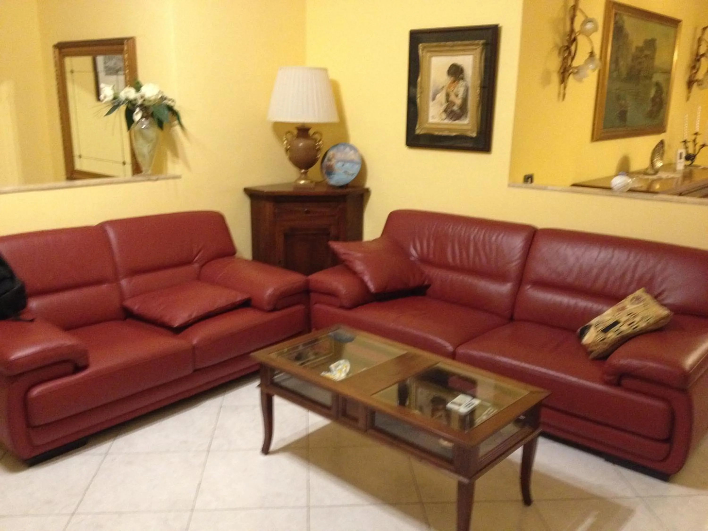 Communal lounge/ TV room in B&B Serenità