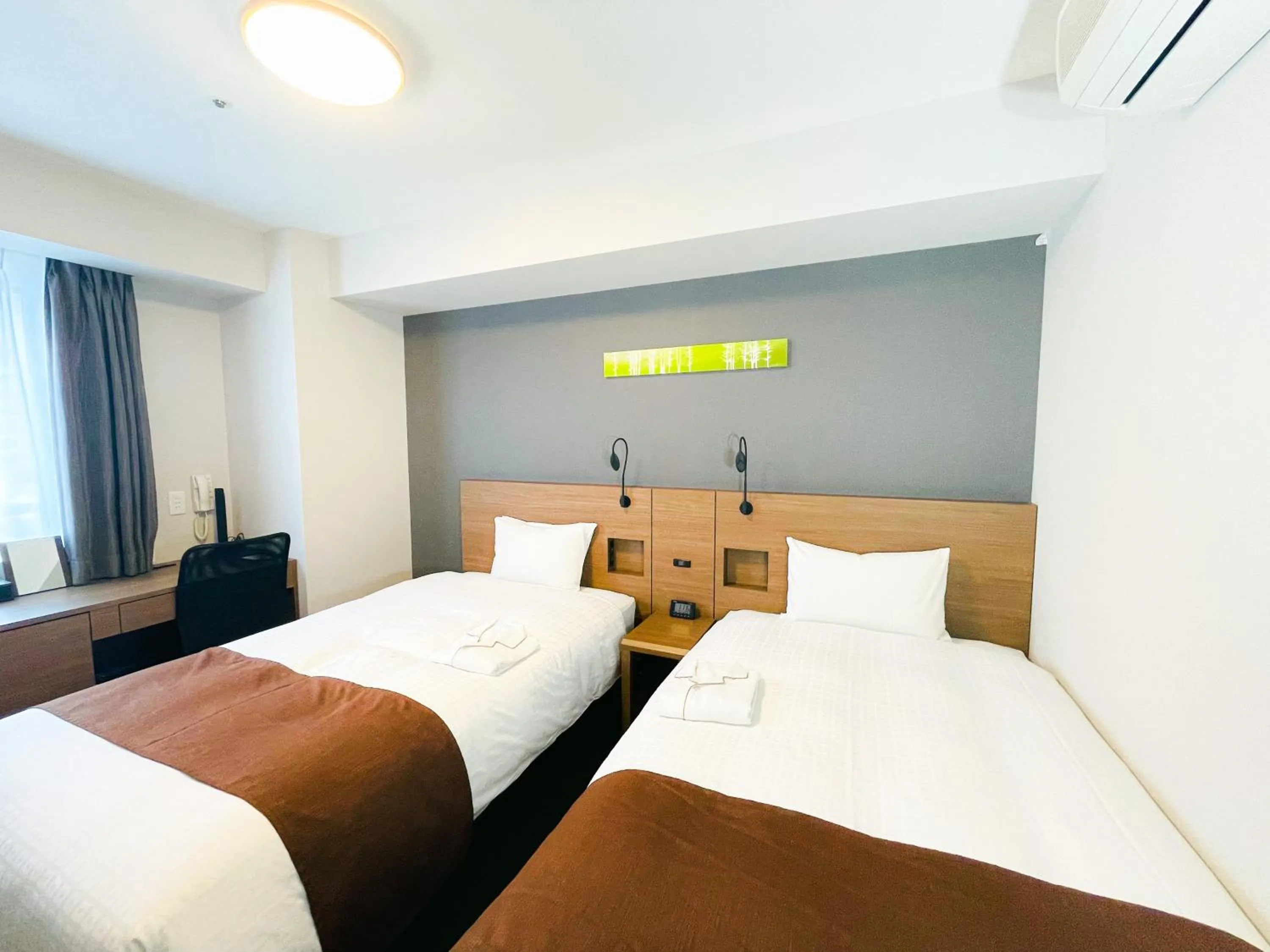 Bed in Smile Hotel Premium Sapporo Susukino