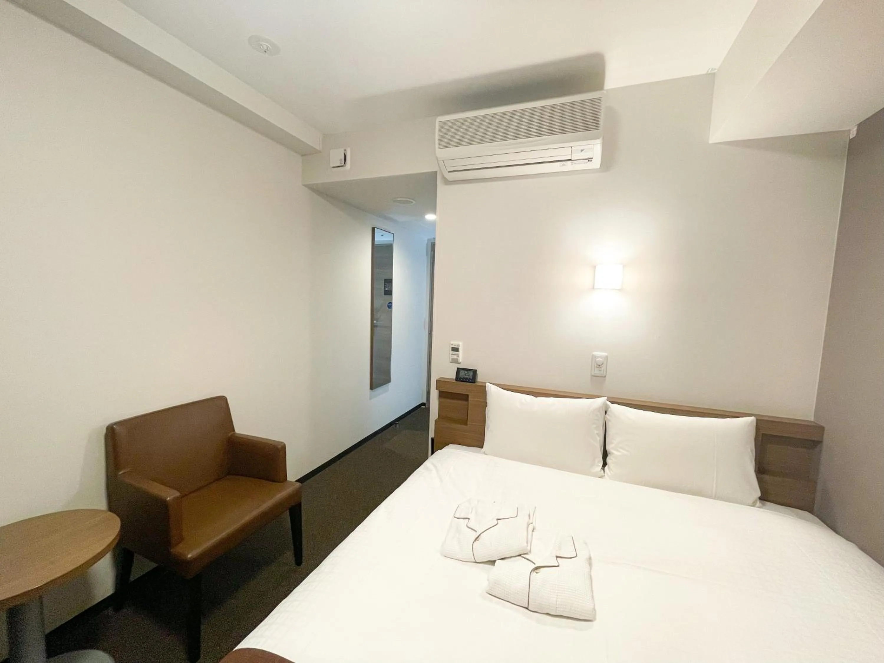 Bed in Smile Hotel Premium Sapporo Susukino