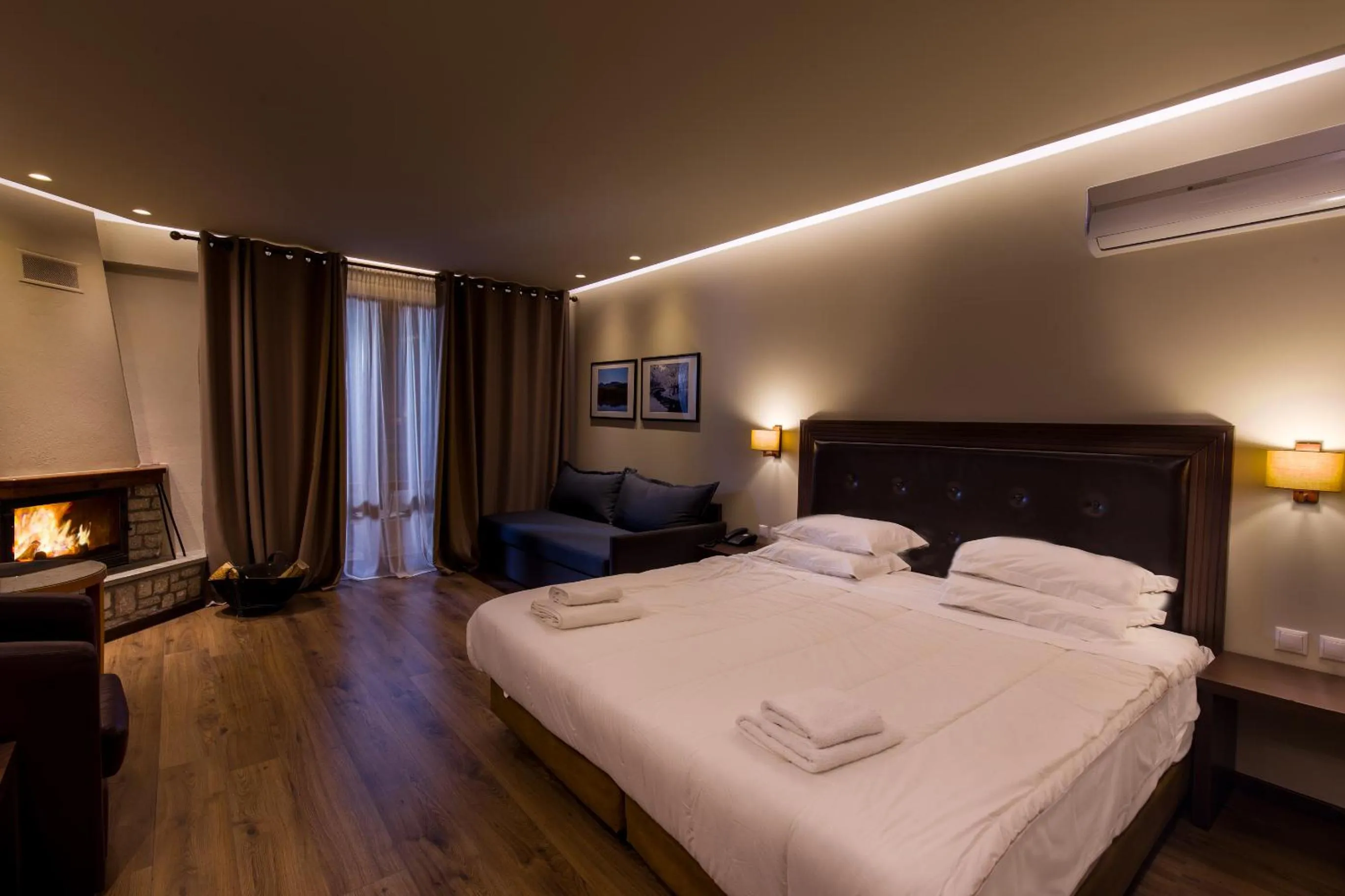 Living room, Bed in Nevros Hotel Resort and Spa Limni Plastira