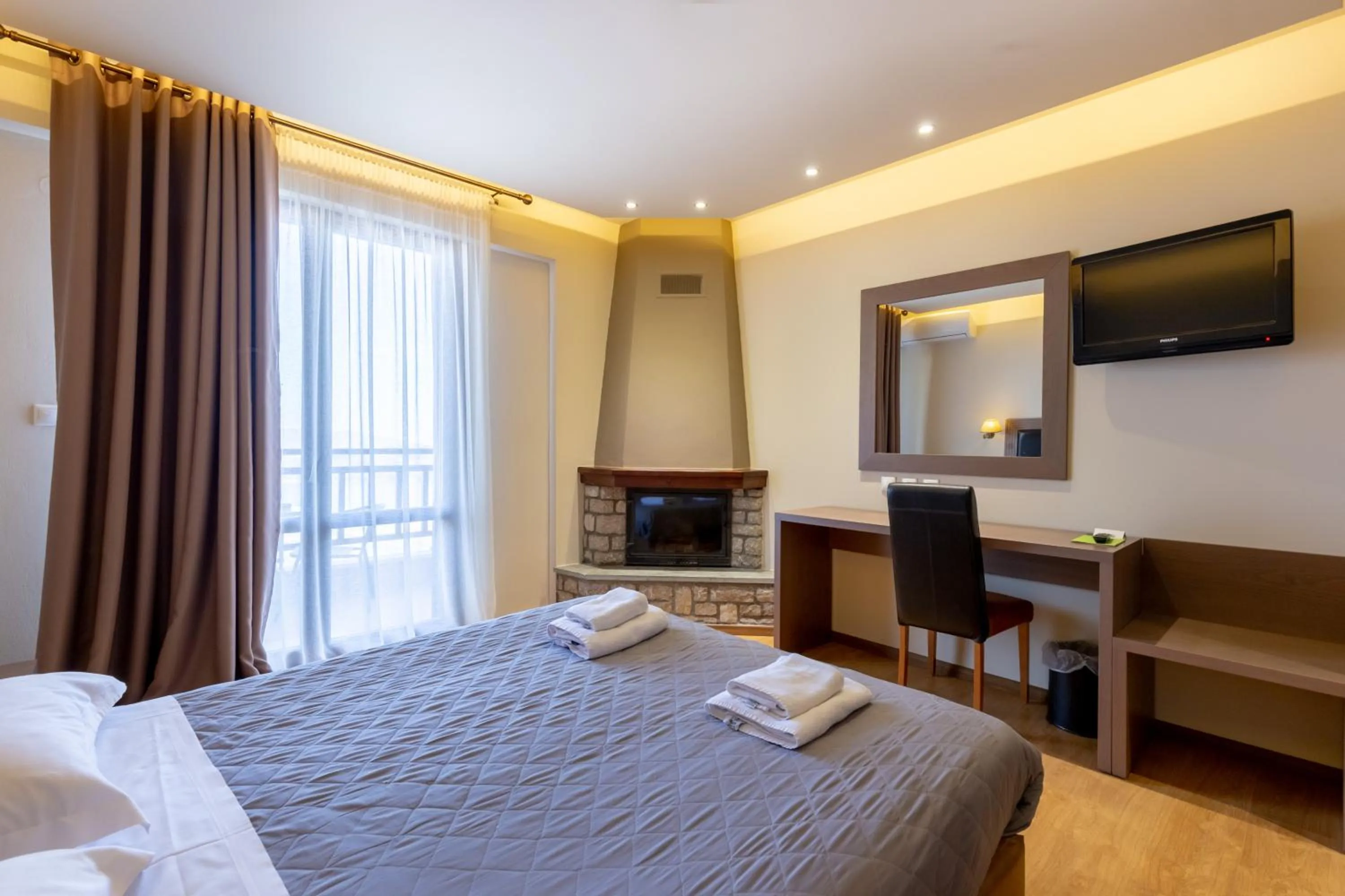 Bedroom, Bed in Nevros Hotel Resort and Spa Limni Plastira