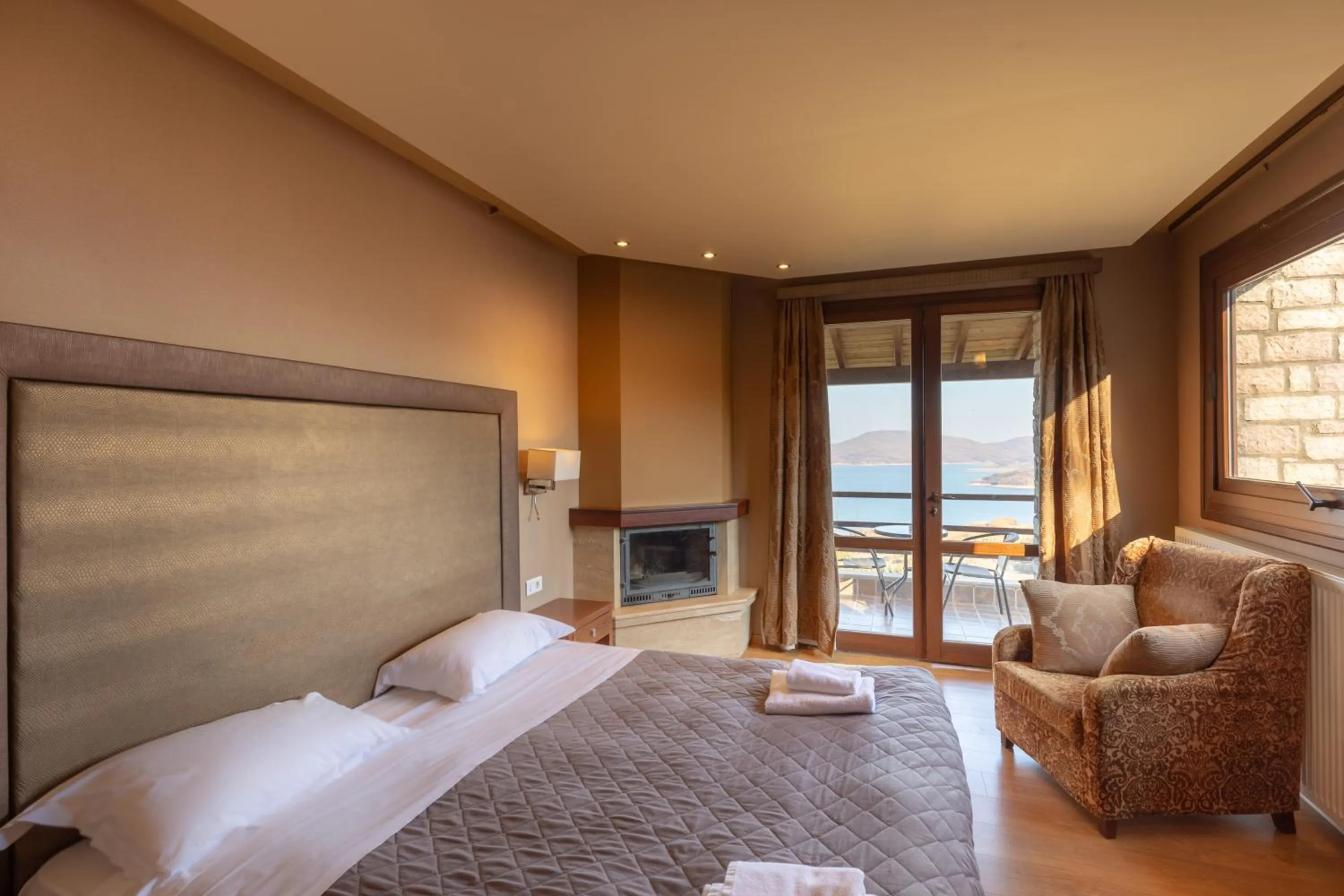 Balcony/Terrace, Bed in Nevros Hotel Resort and Spa Limni Plastira