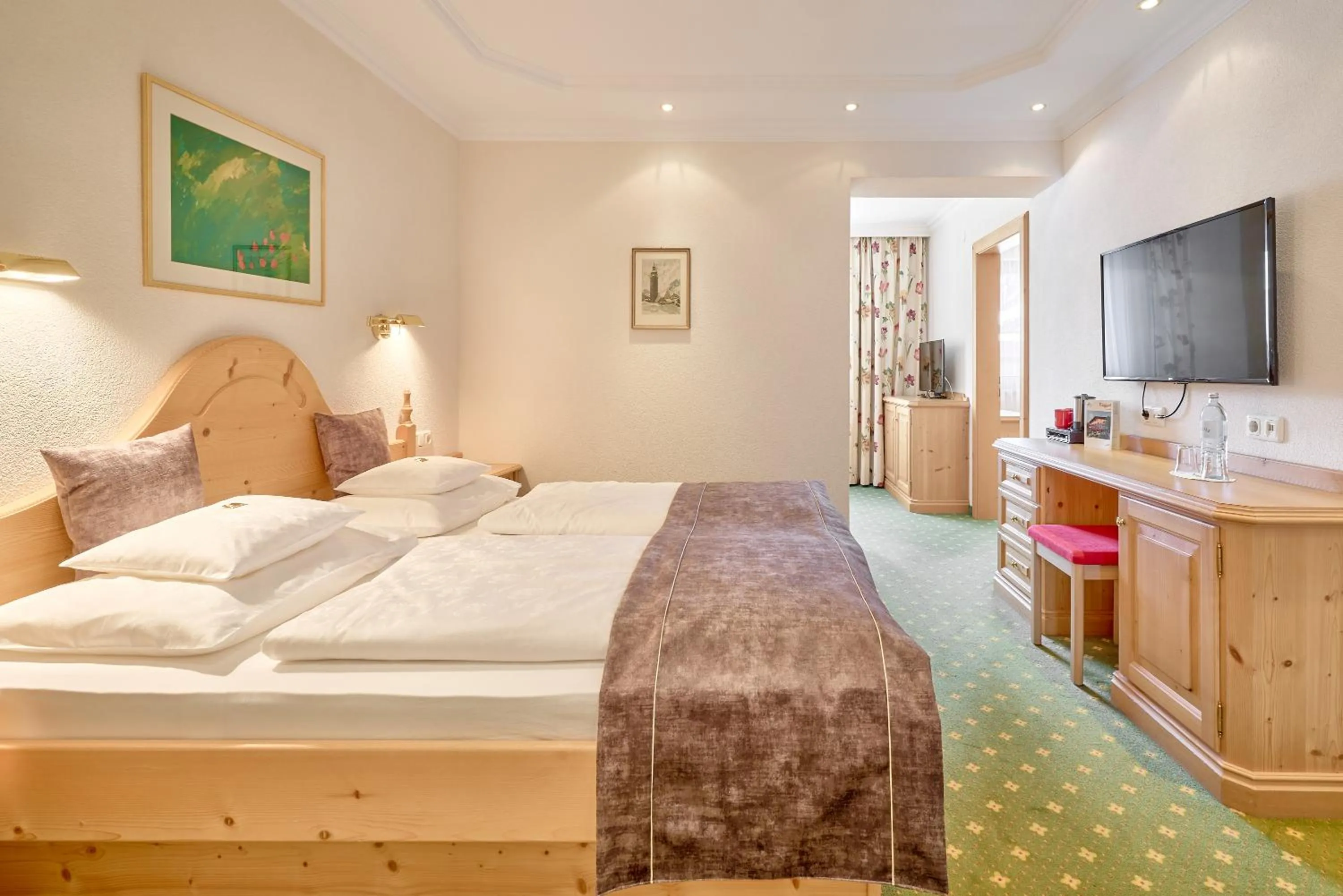 Bed in Hotel Appartement Roggal