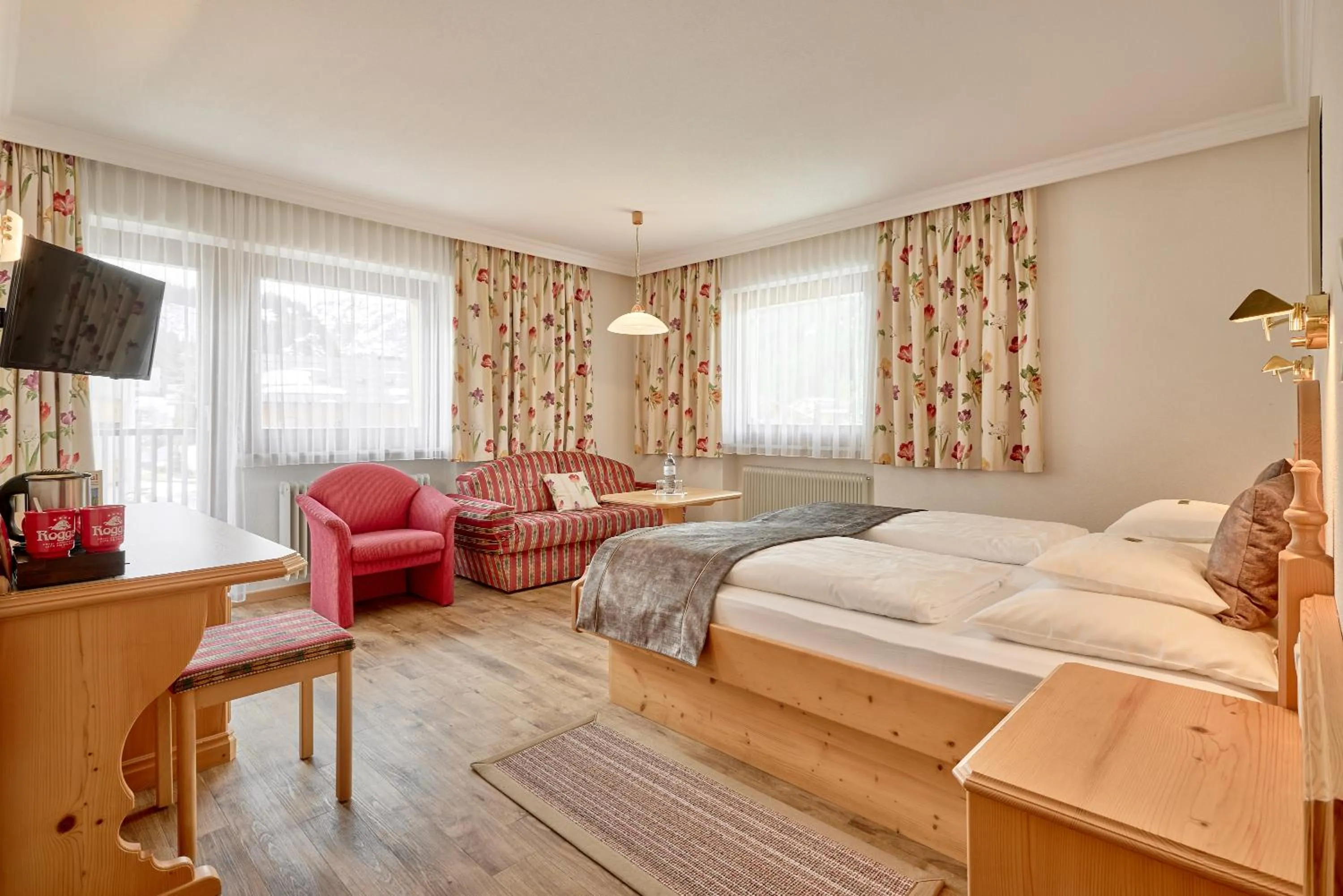 Bed in Hotel Appartement Roggal