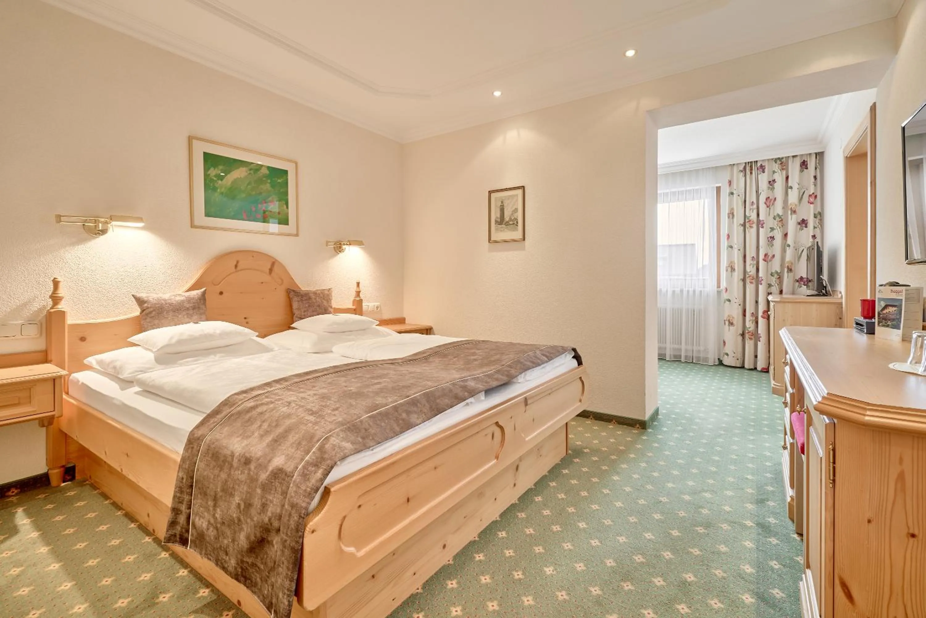 Bed in Hotel Appartement Roggal